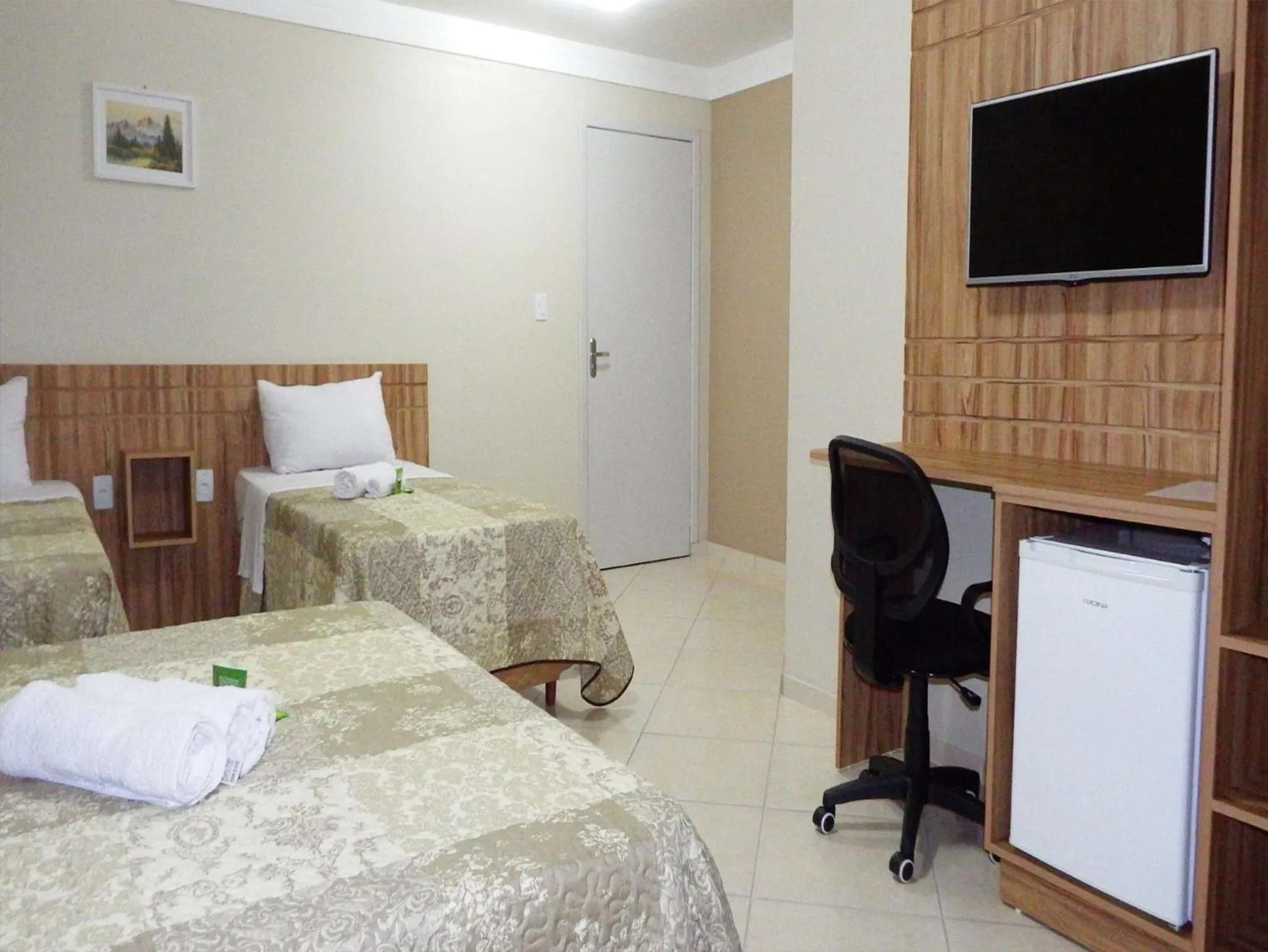 Bed in Coral Palace Hotel