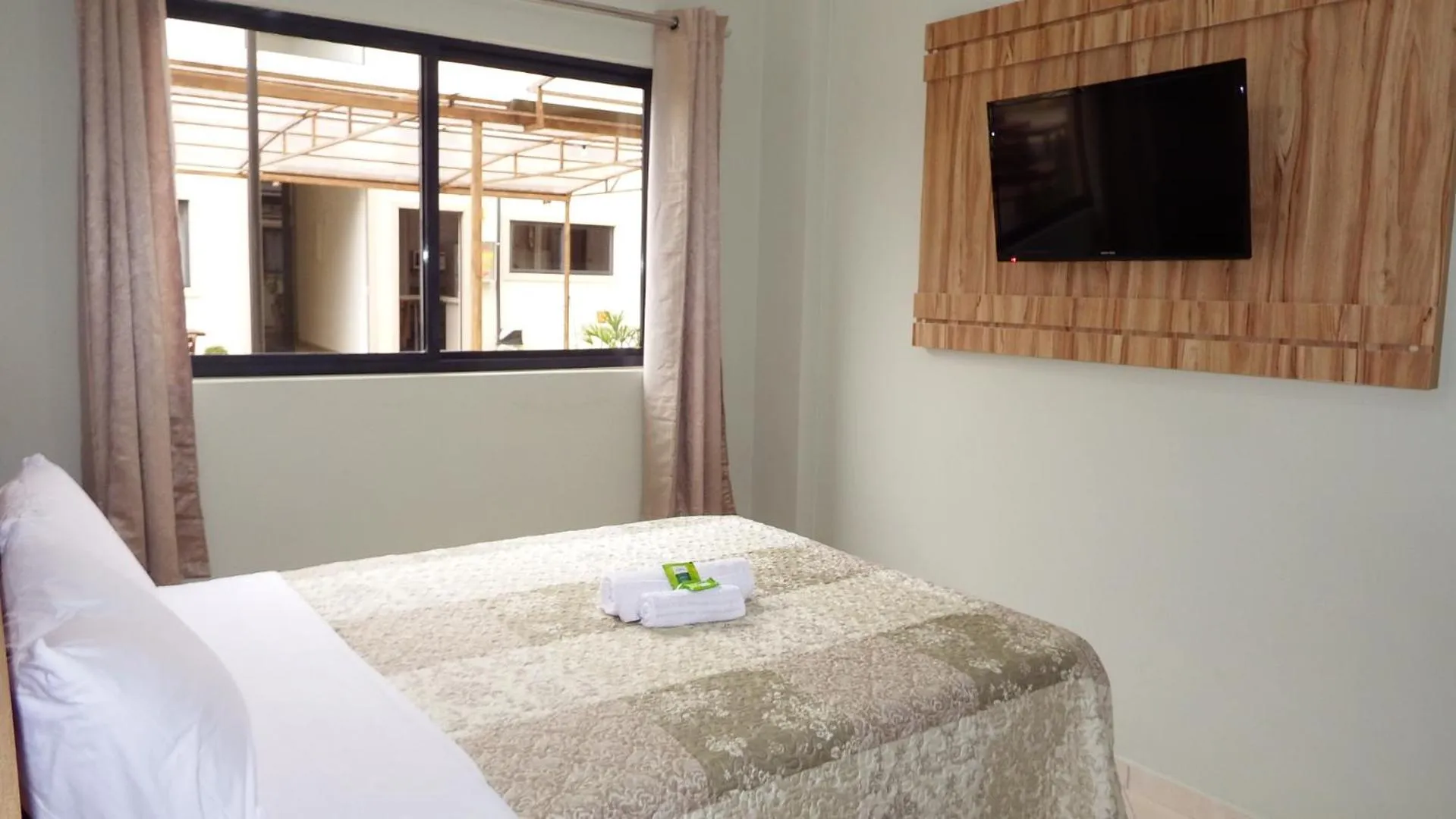 Bed in Coral Palace Hotel