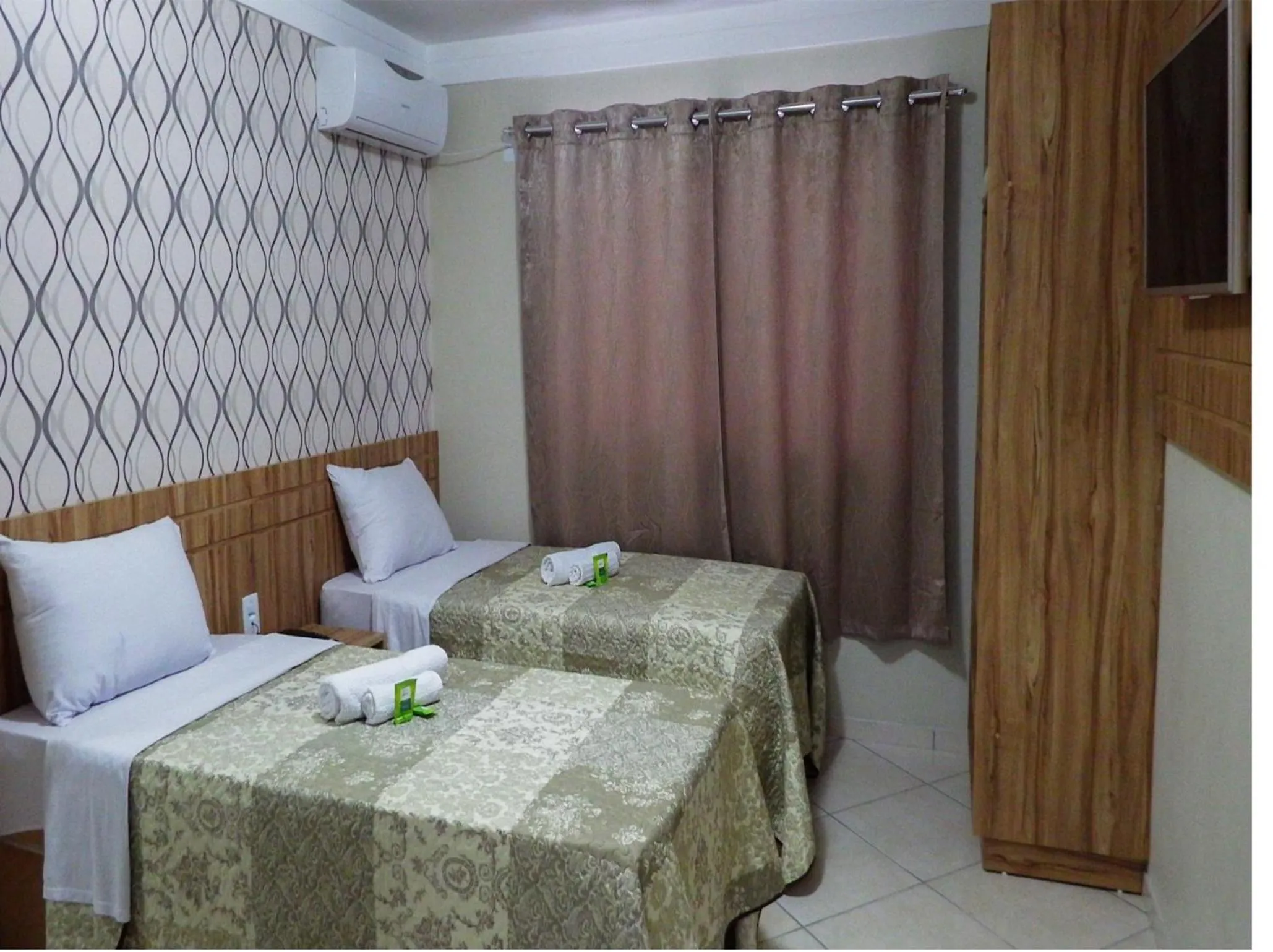 Bed in Coral Palace Hotel