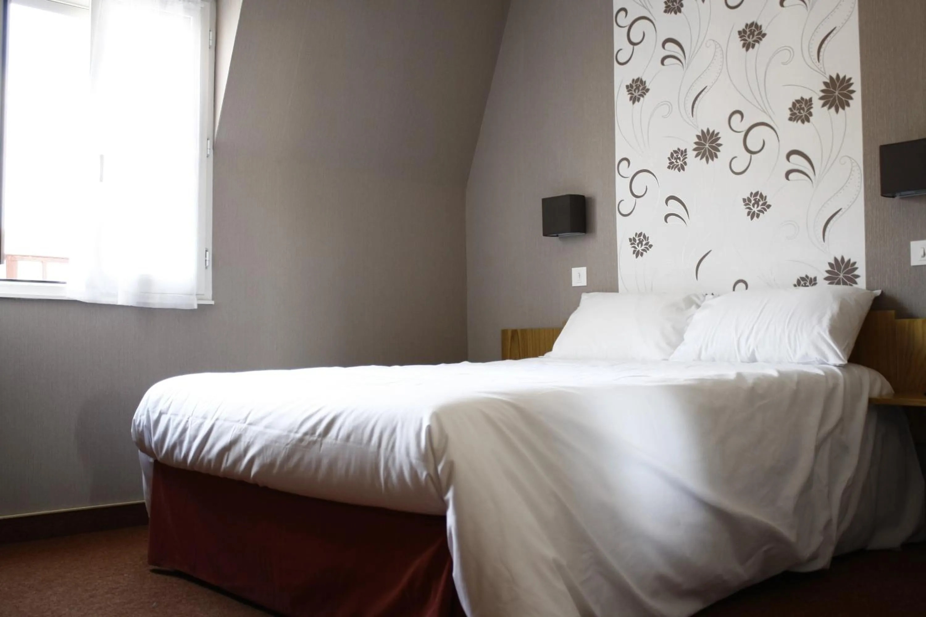 Bed in Hotel du Touring