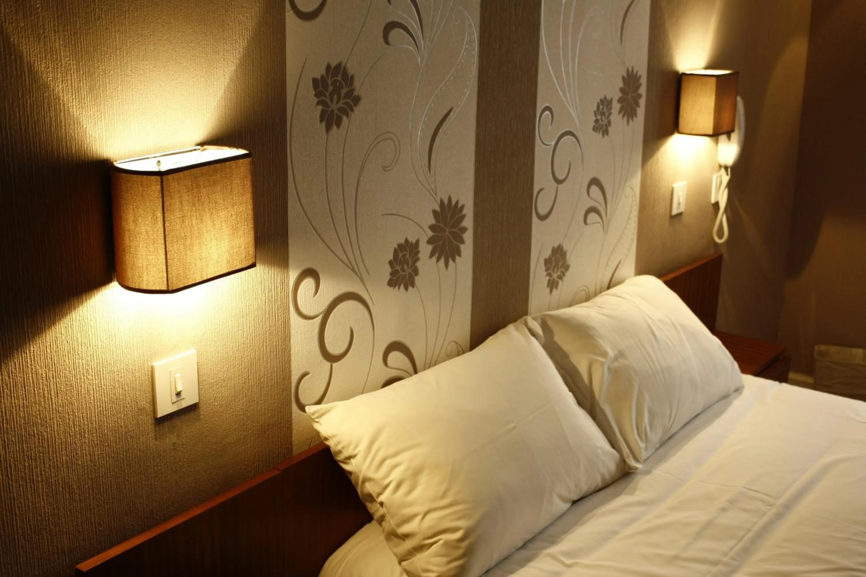 Decorative detail, Bed in Hotel du Touring