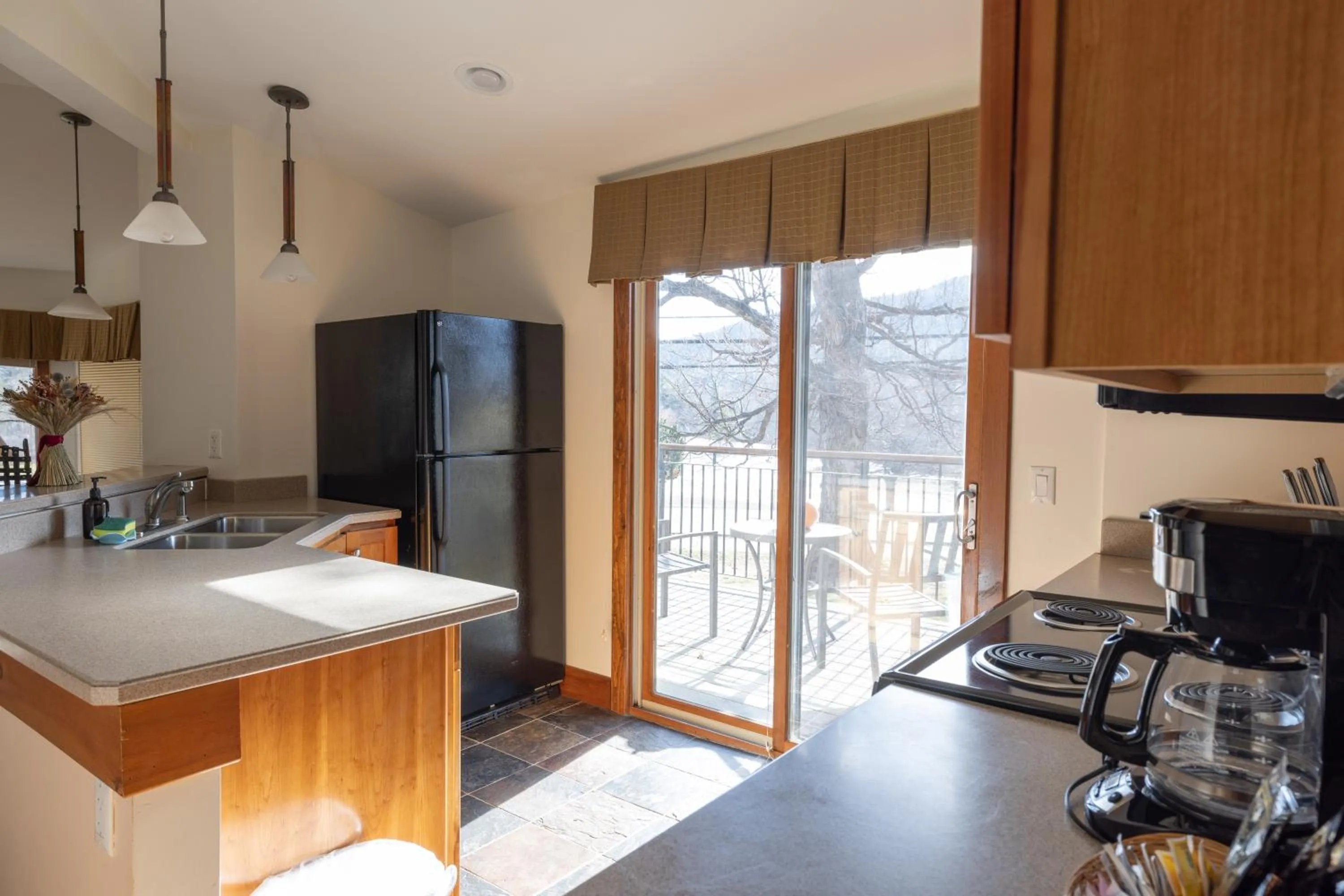 Kitchen or kitchenette in Winwood Condominiums by Windham Mountain Club