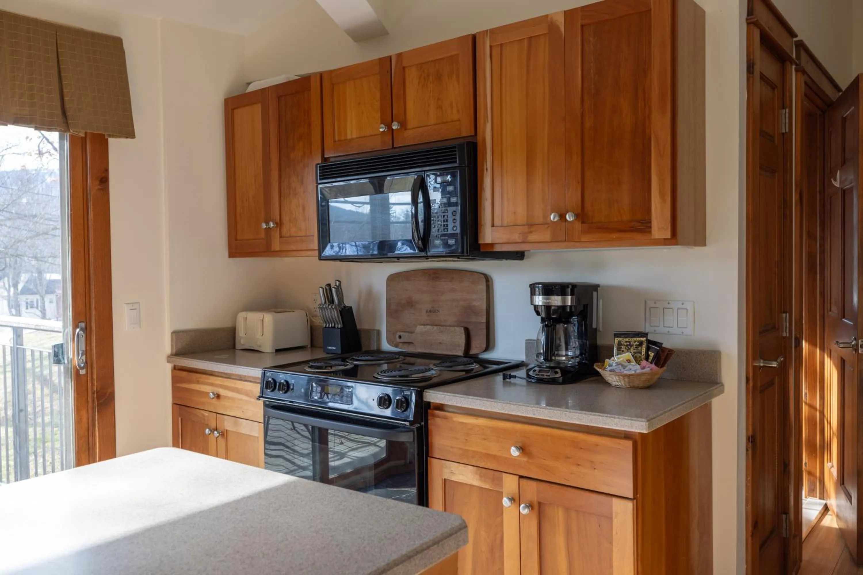 Kitchen or kitchenette in Winwood Condominiums by Windham Mountain Club