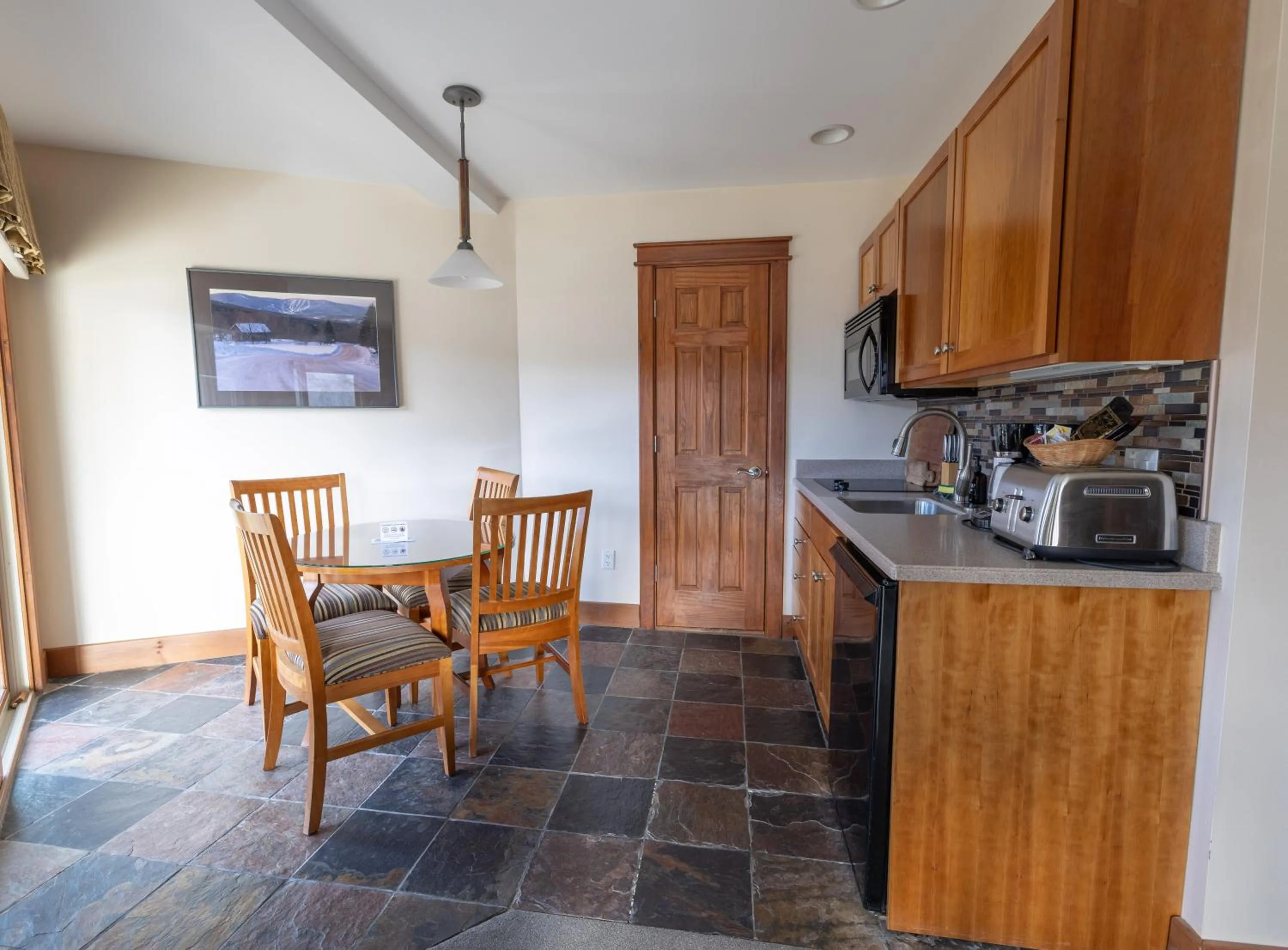Kitchen or kitchenette in Winwood Condominiums by Windham Mountain Club