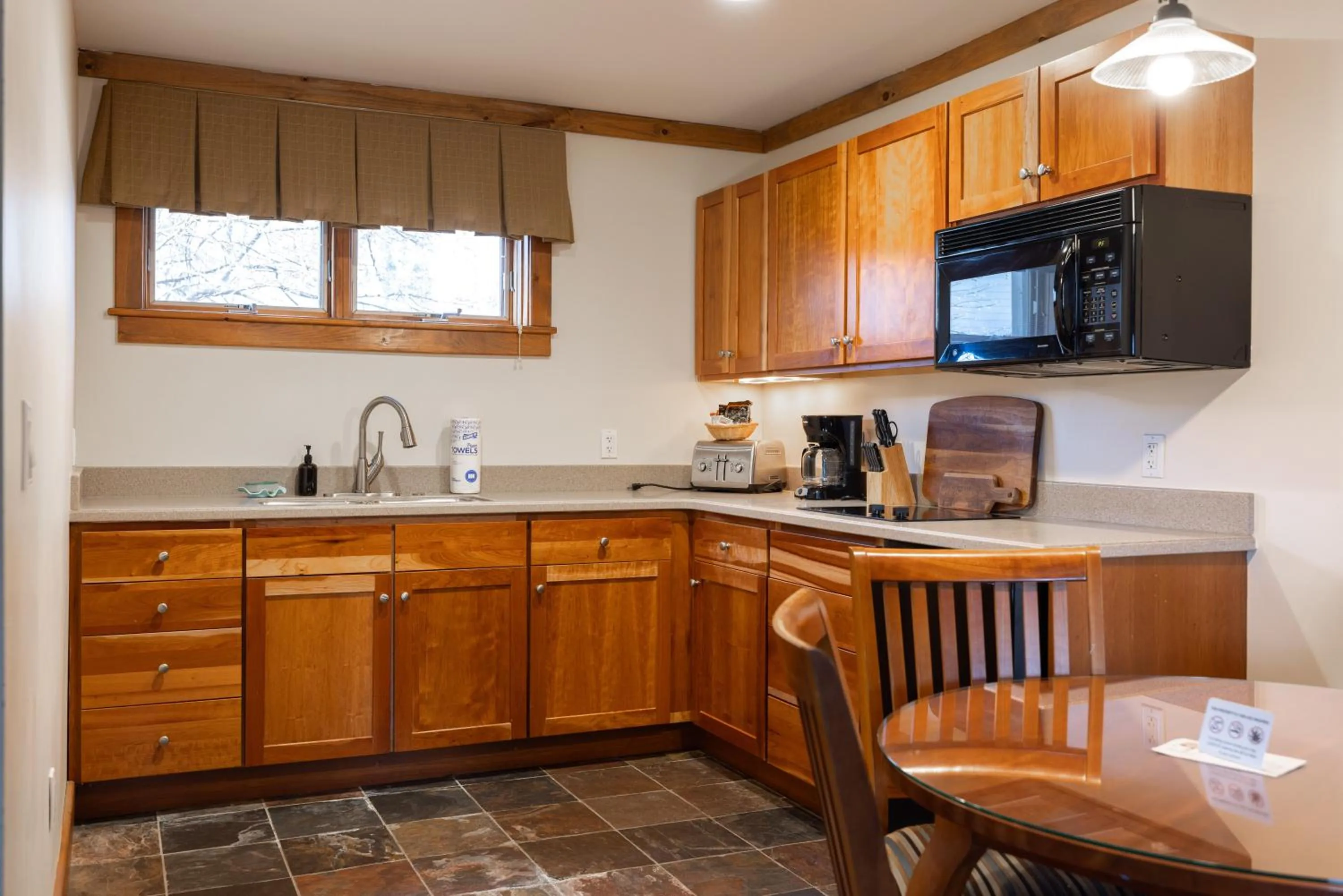 Kitchen or kitchenette in Winwood Condominiums by Windham Mountain Club