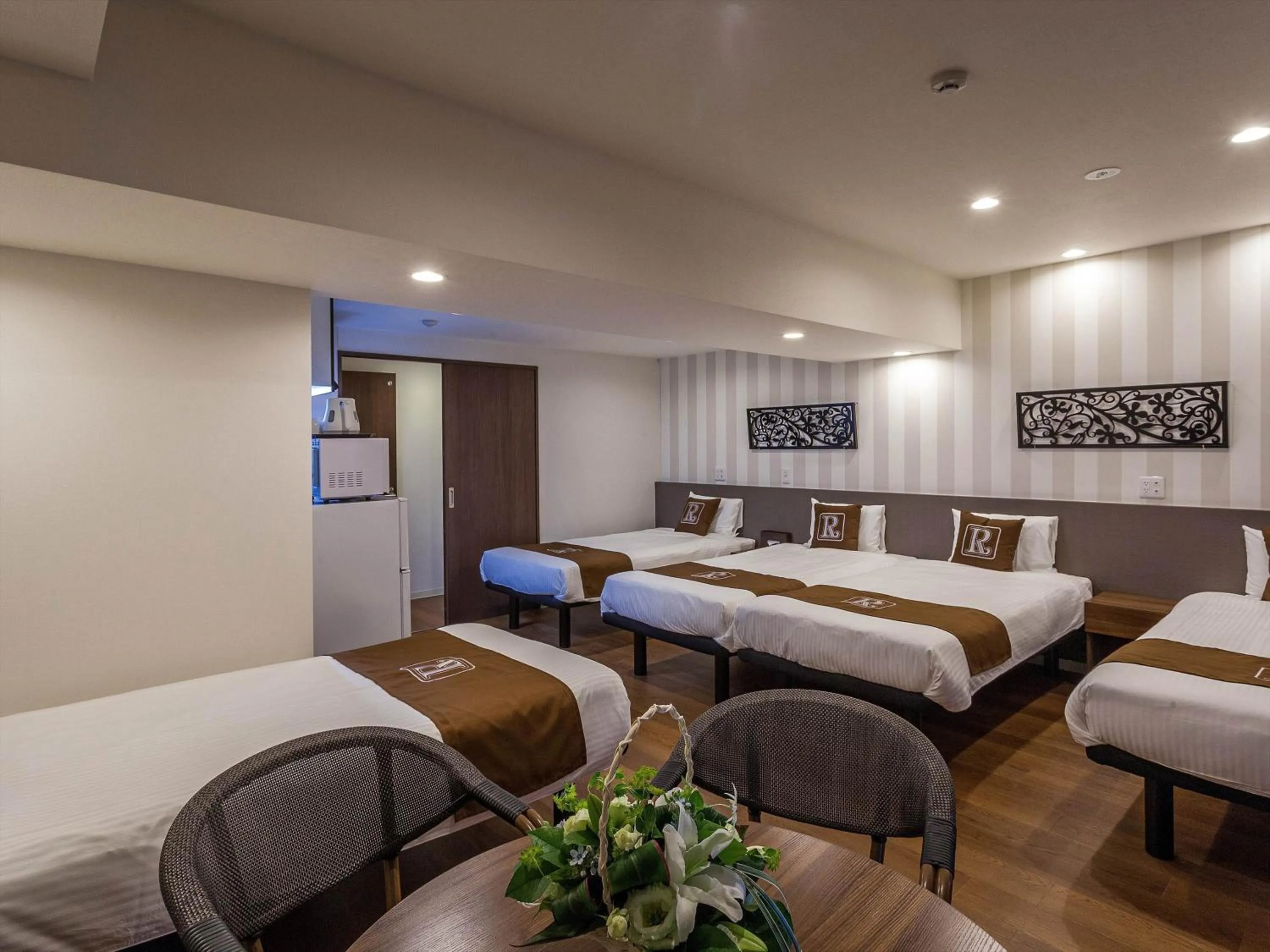 Bed in Living Inn Asahibashiekimae Premier