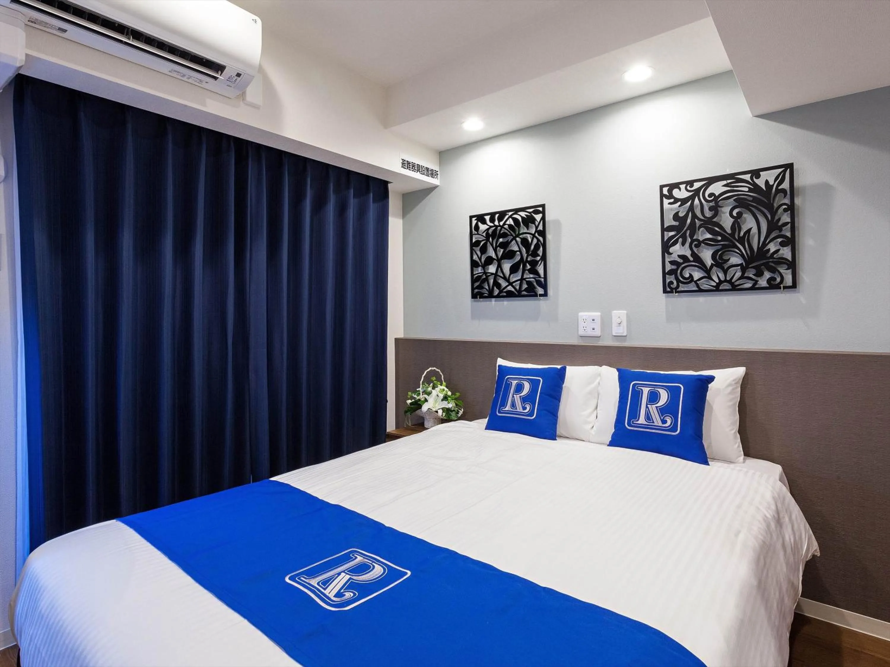 Bed in Living Inn Asahibashiekimae Premier