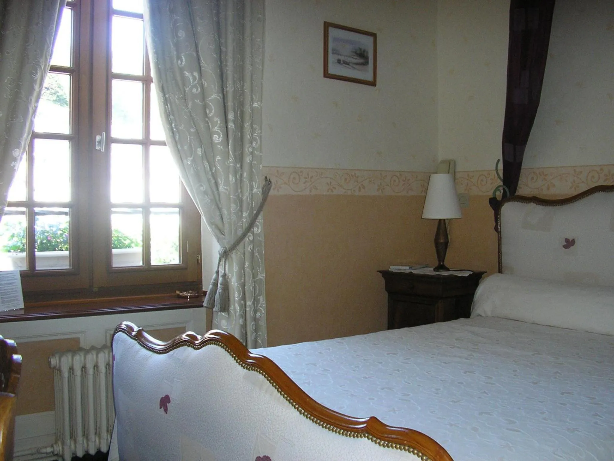 Bed in Relais Saint Louis, Logis