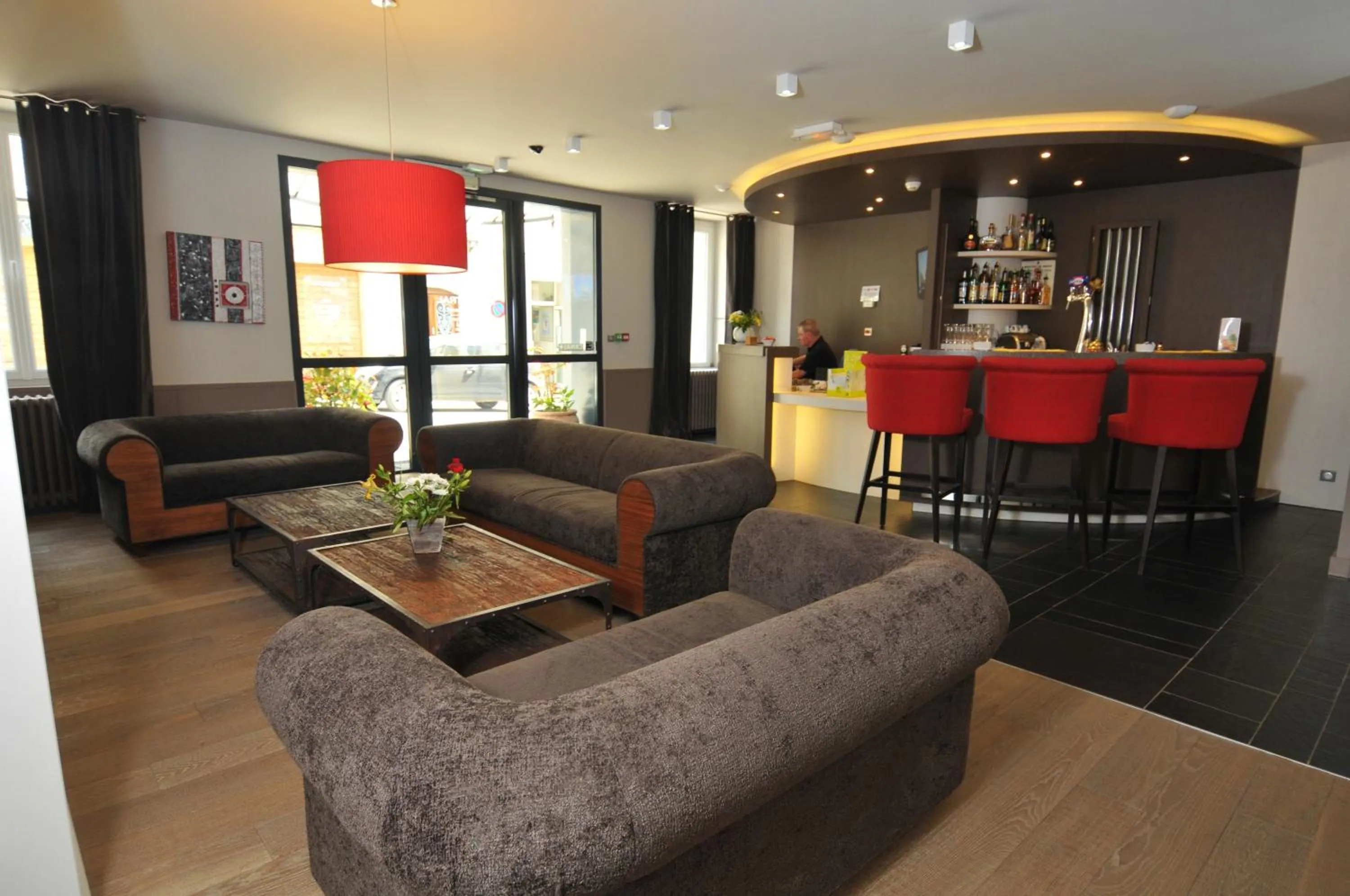 Living room in Logis Hôtel Le Central