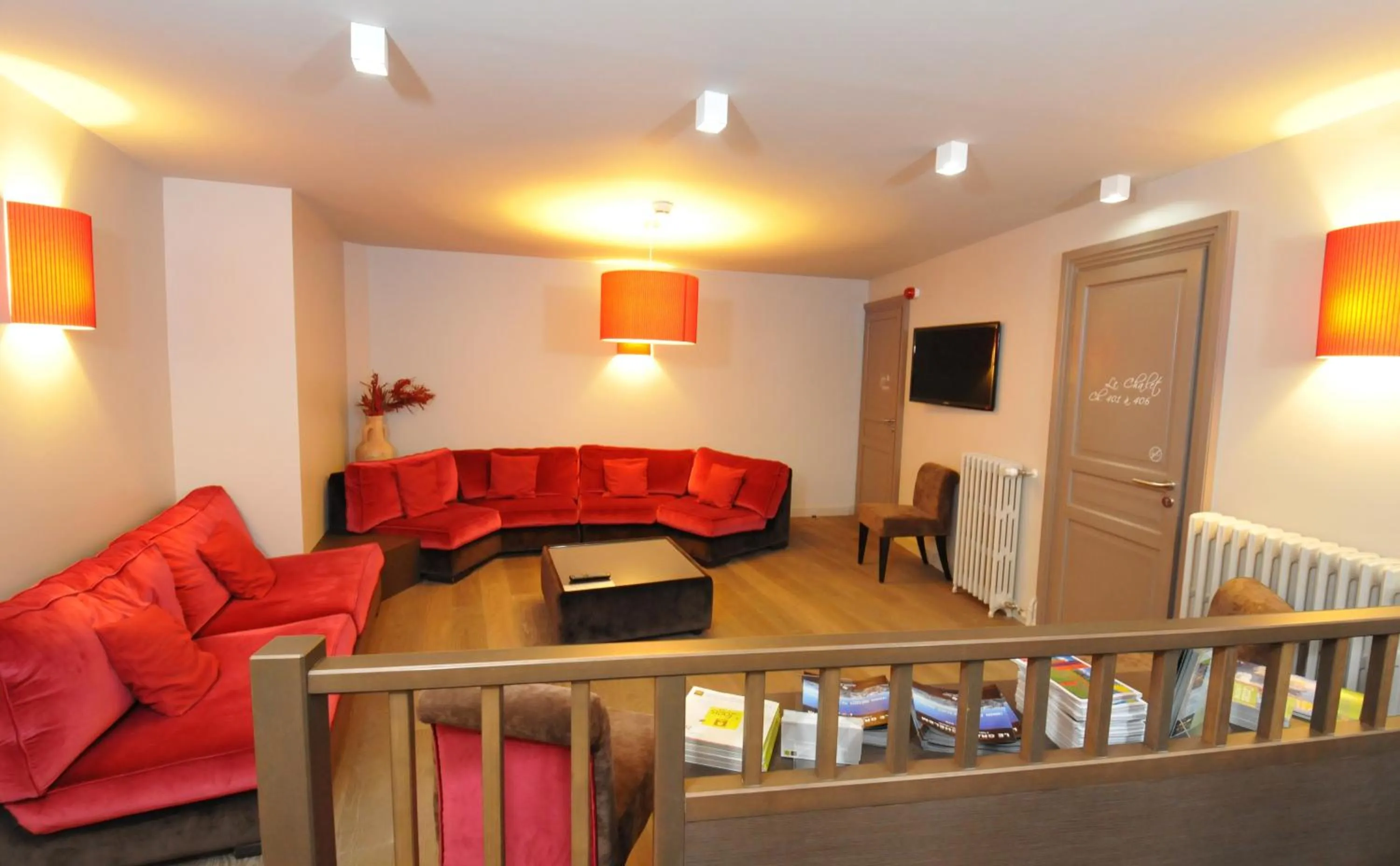 Living room, Bed in Logis Hôtel Le Central