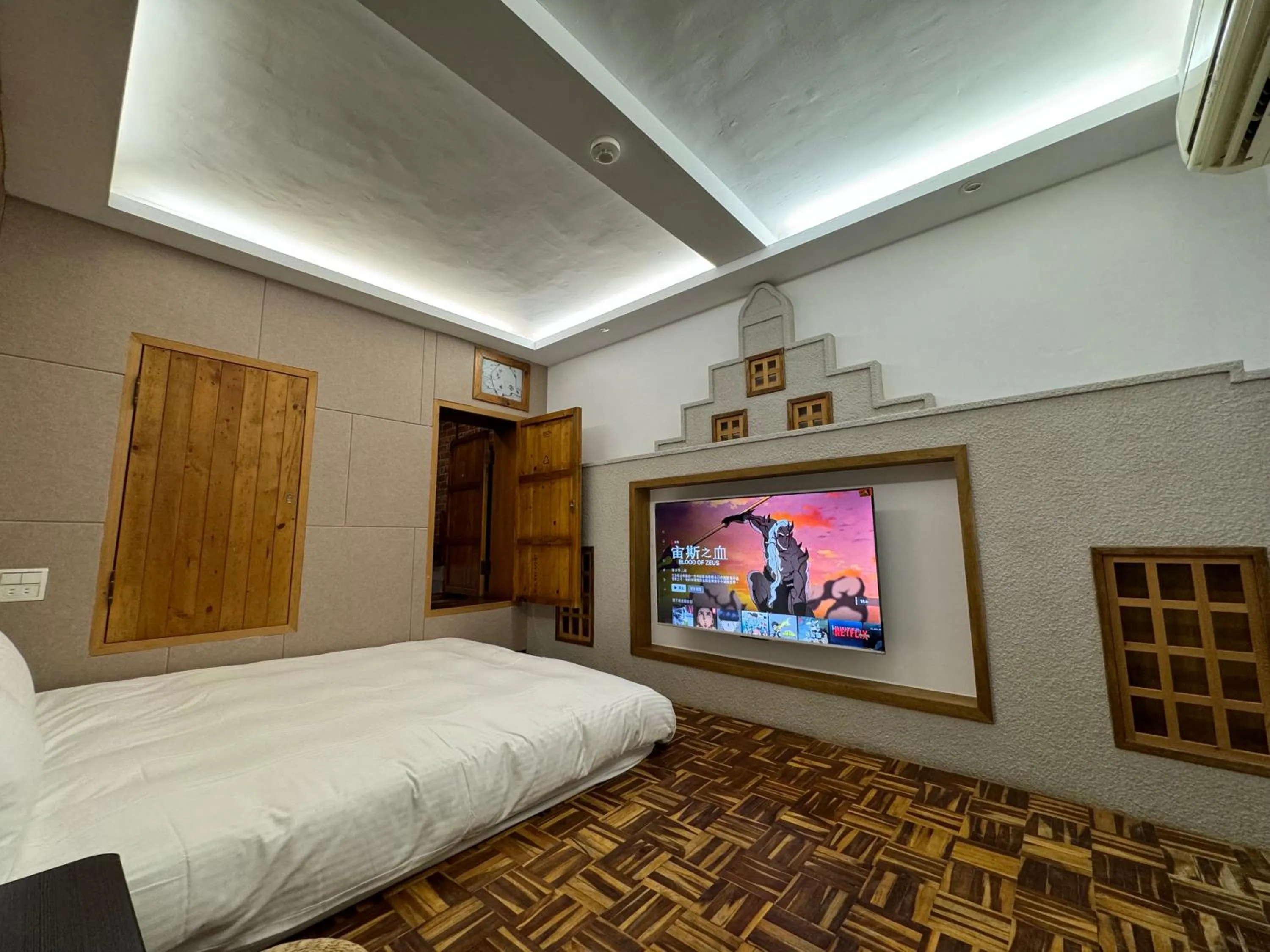 Bed in 慢步南國 台南故事民宿 Slow Tainan Homestay