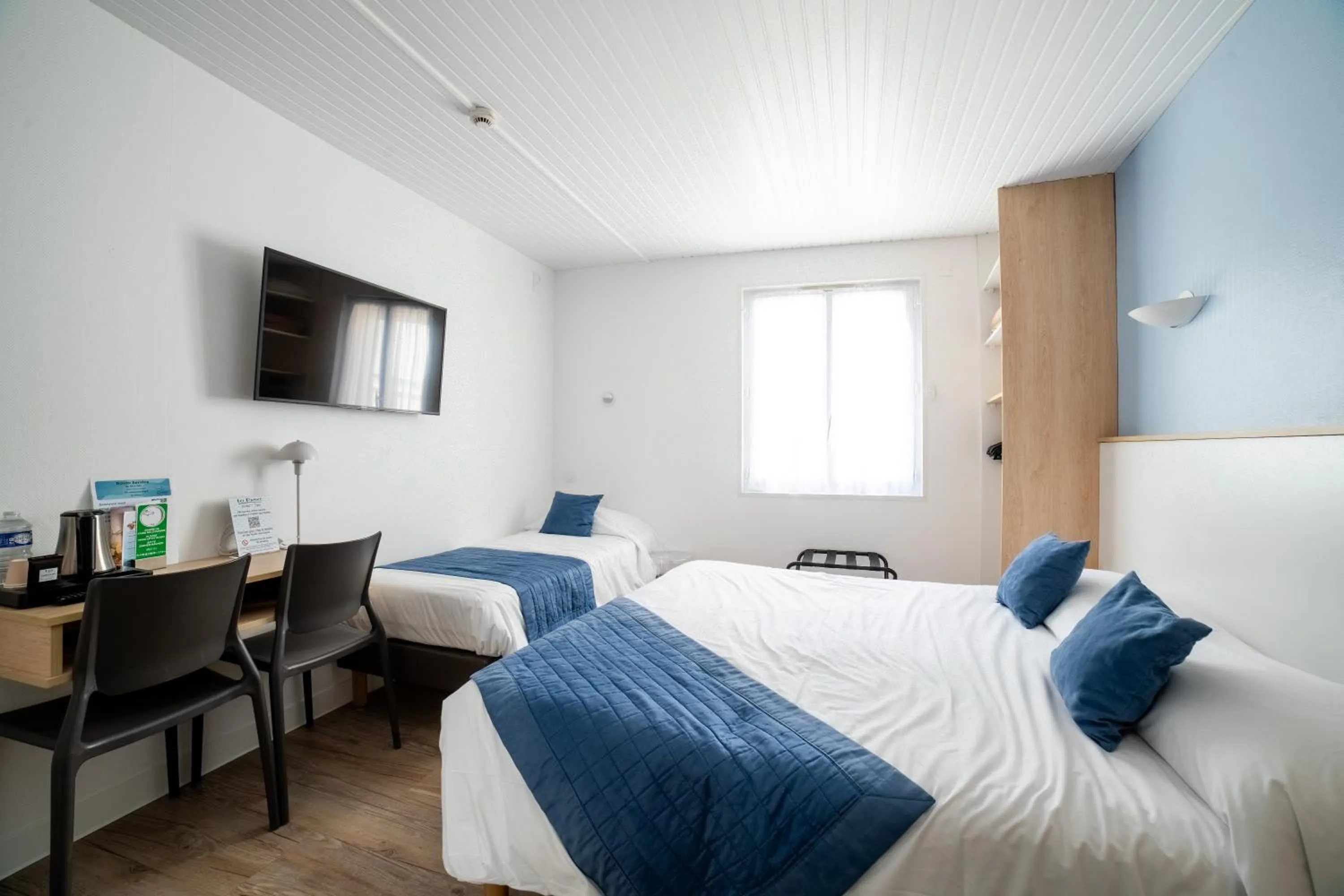 Bed in Hotel Les Dunes