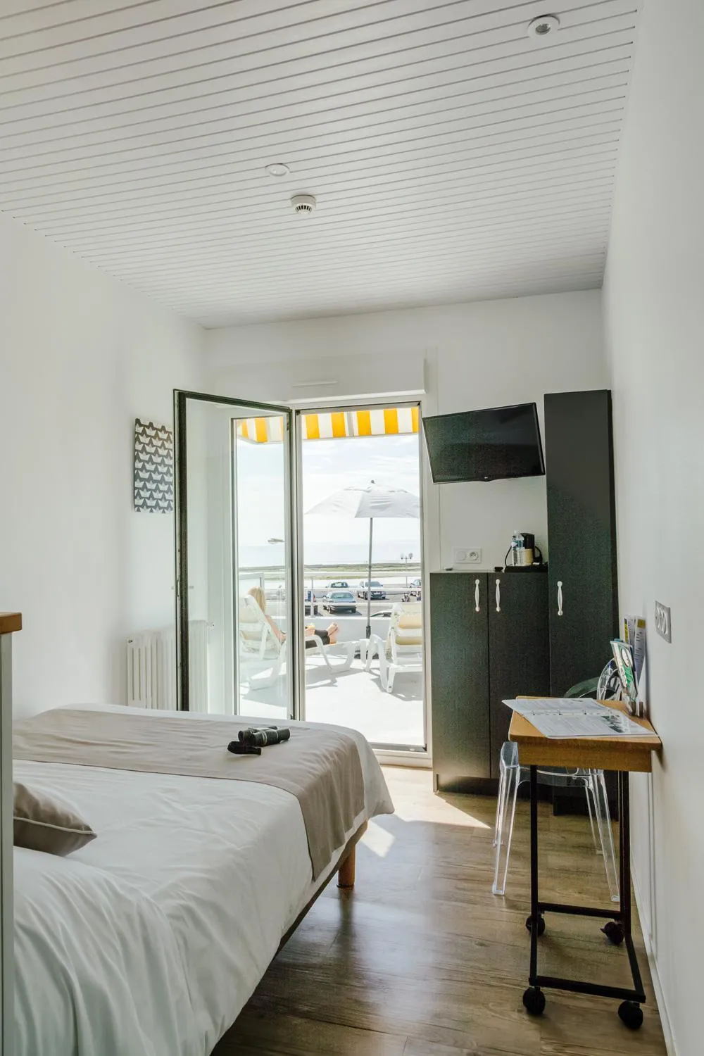 Bed in Hotel Les Dunes