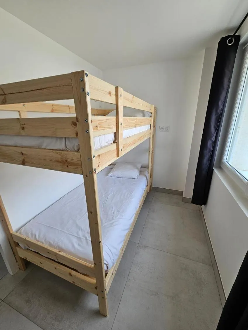 Bed in Hotel Les Dunes