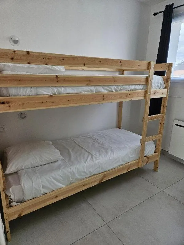 Bed in Hotel Les Dunes