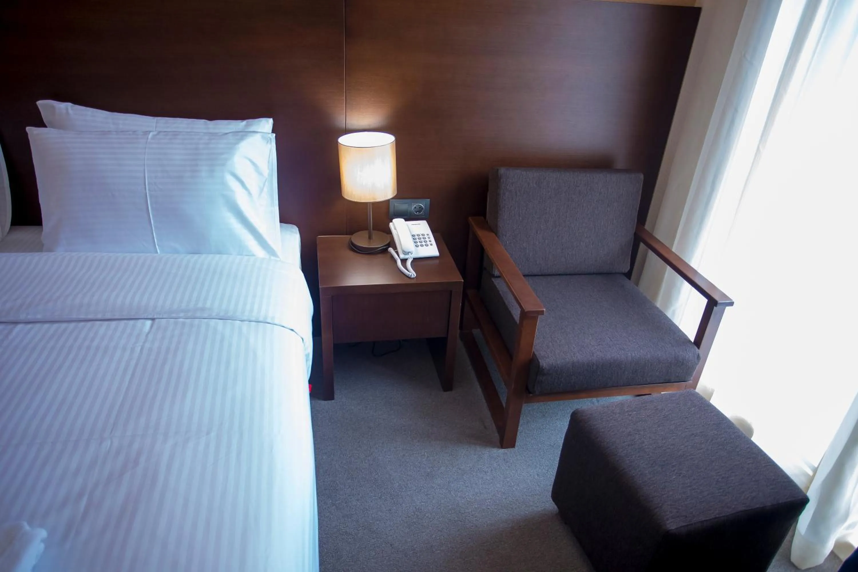 Seating area, Bed in Hotel Corner Inn