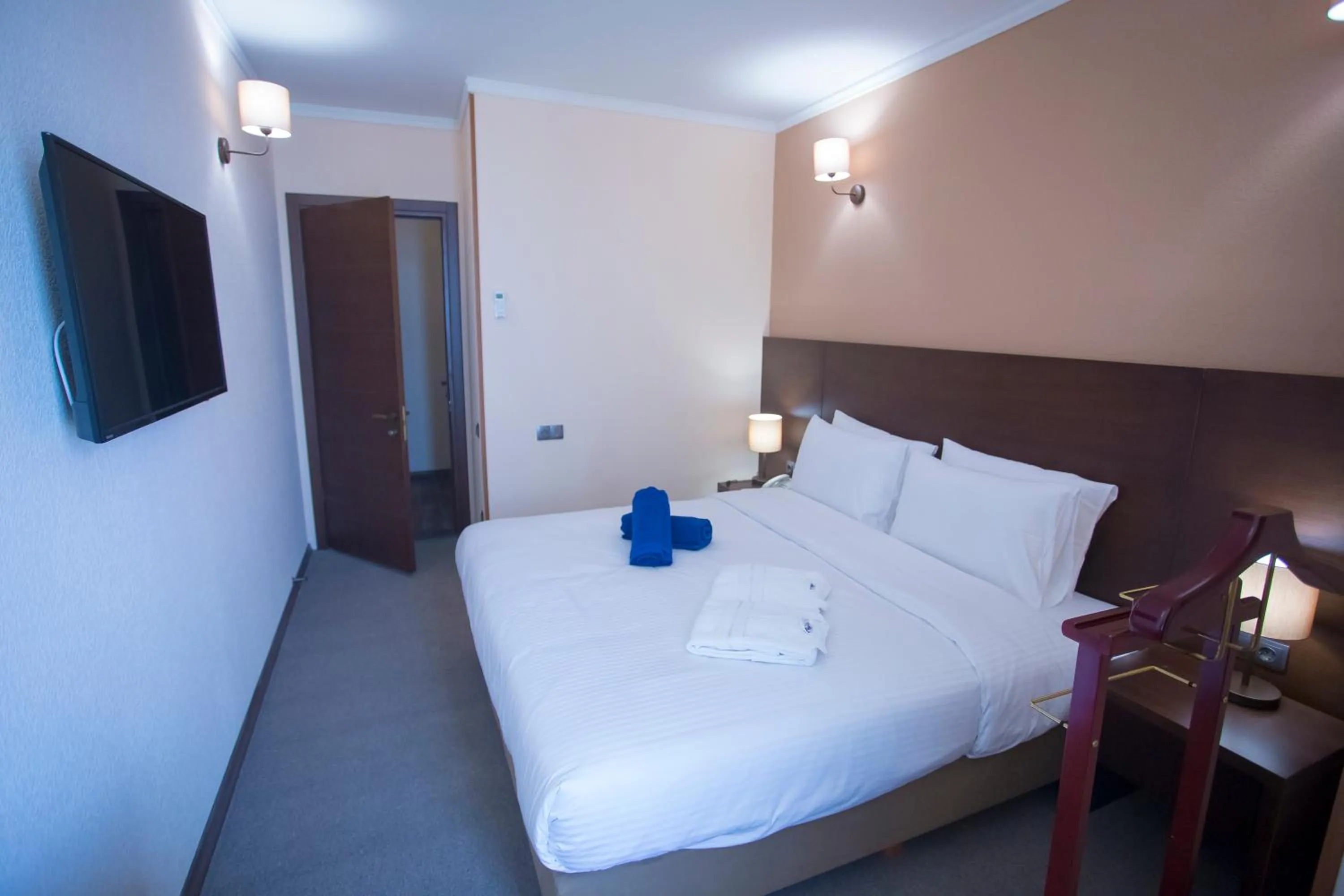 Bed in Hotel Corner Inn