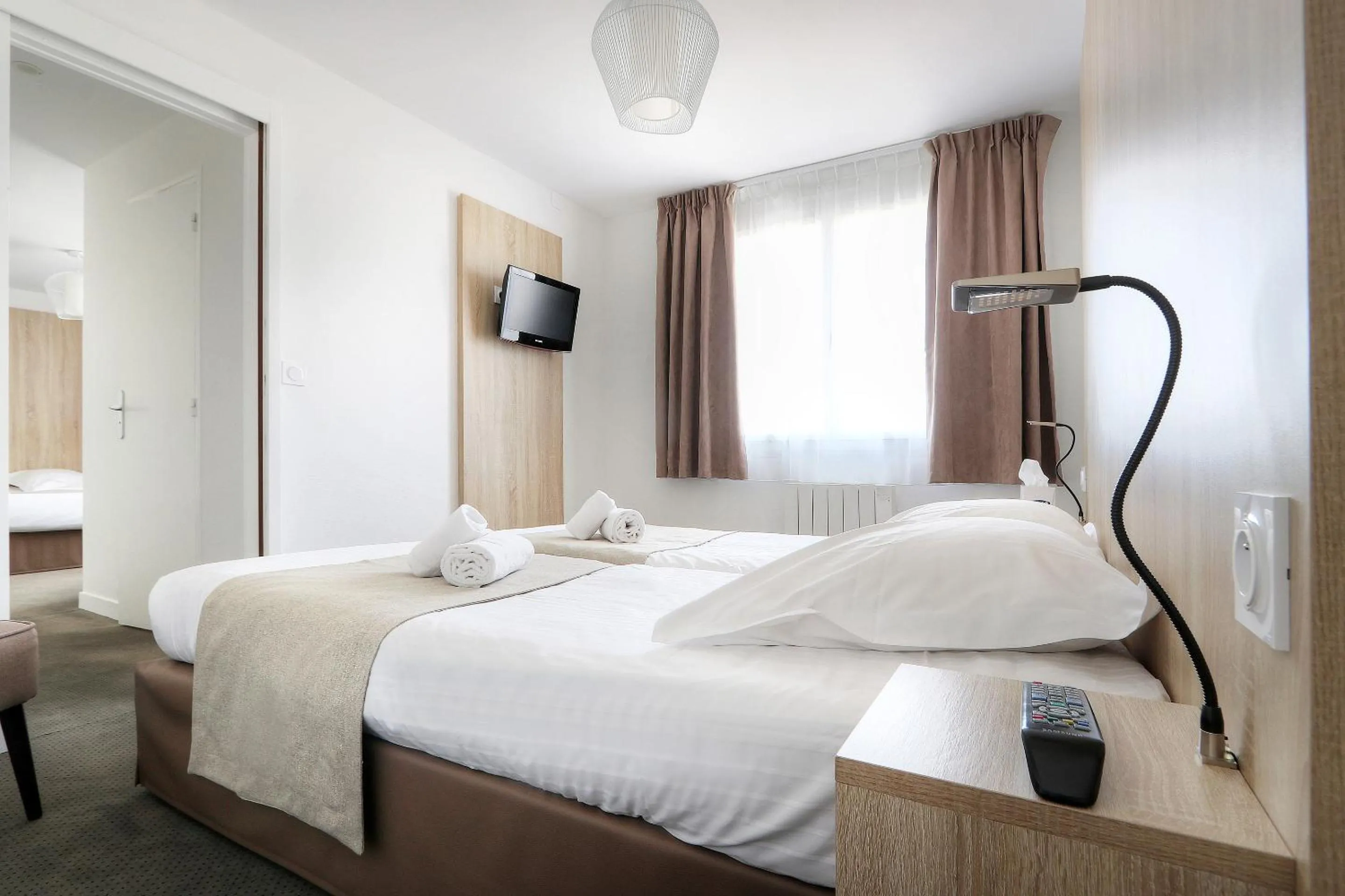 Photo of the whole room, Bed in Hôtel La Petite Sirène Quiberon