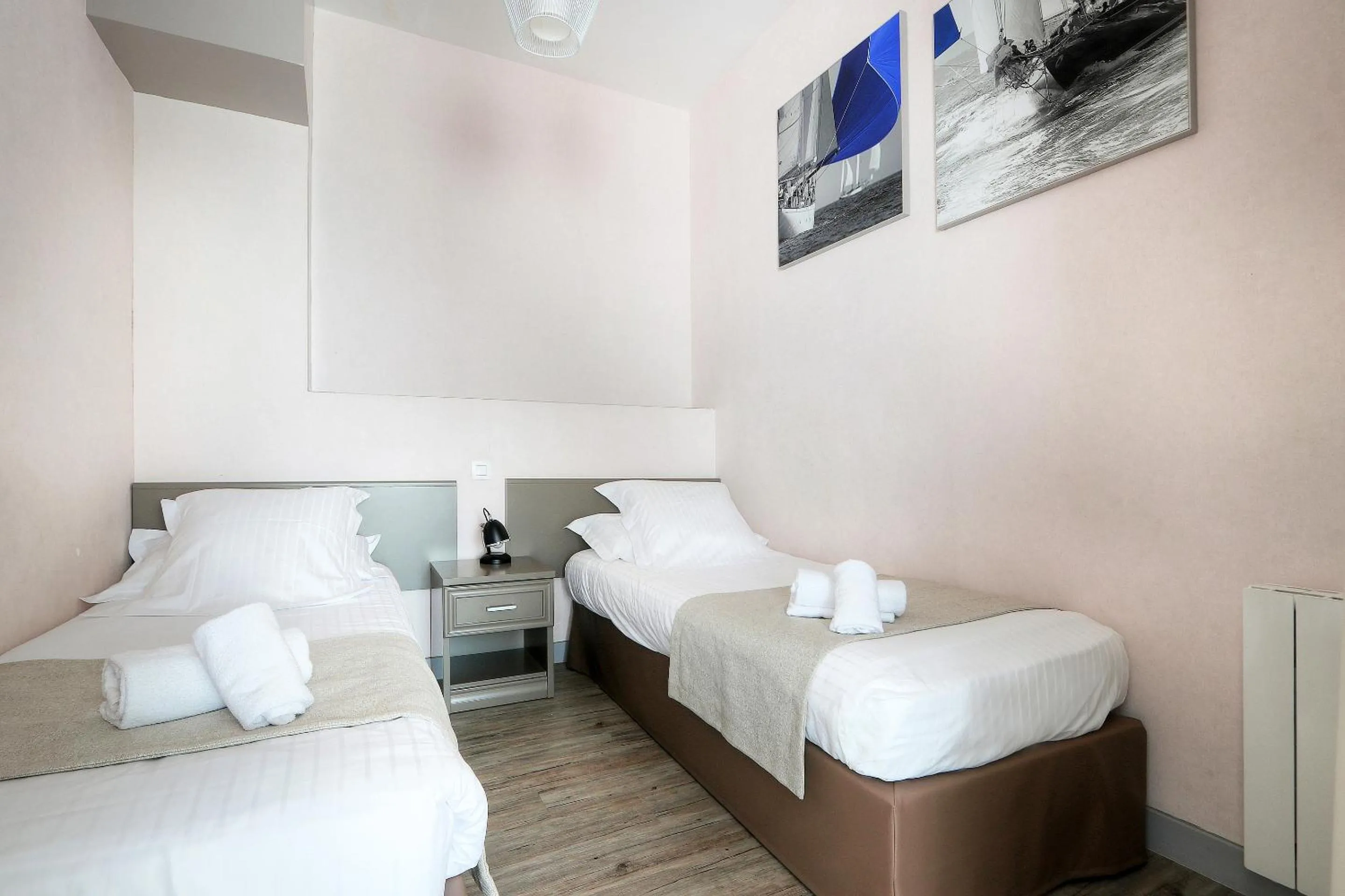 Photo of the whole room, Bed in Hôtel La Petite Sirène Quiberon