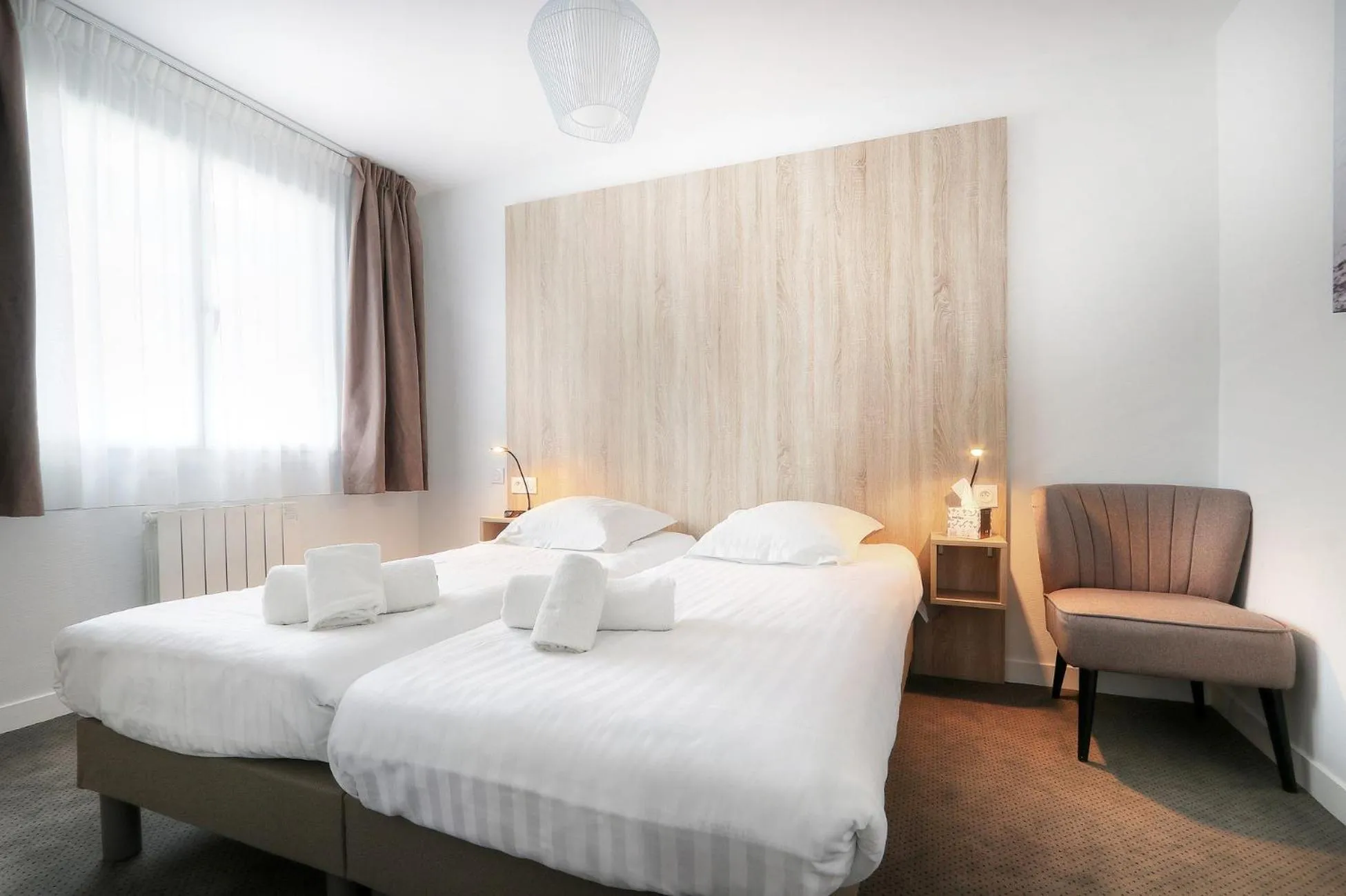 Photo of the whole room, Bed in Hôtel La Petite Sirène Quiberon