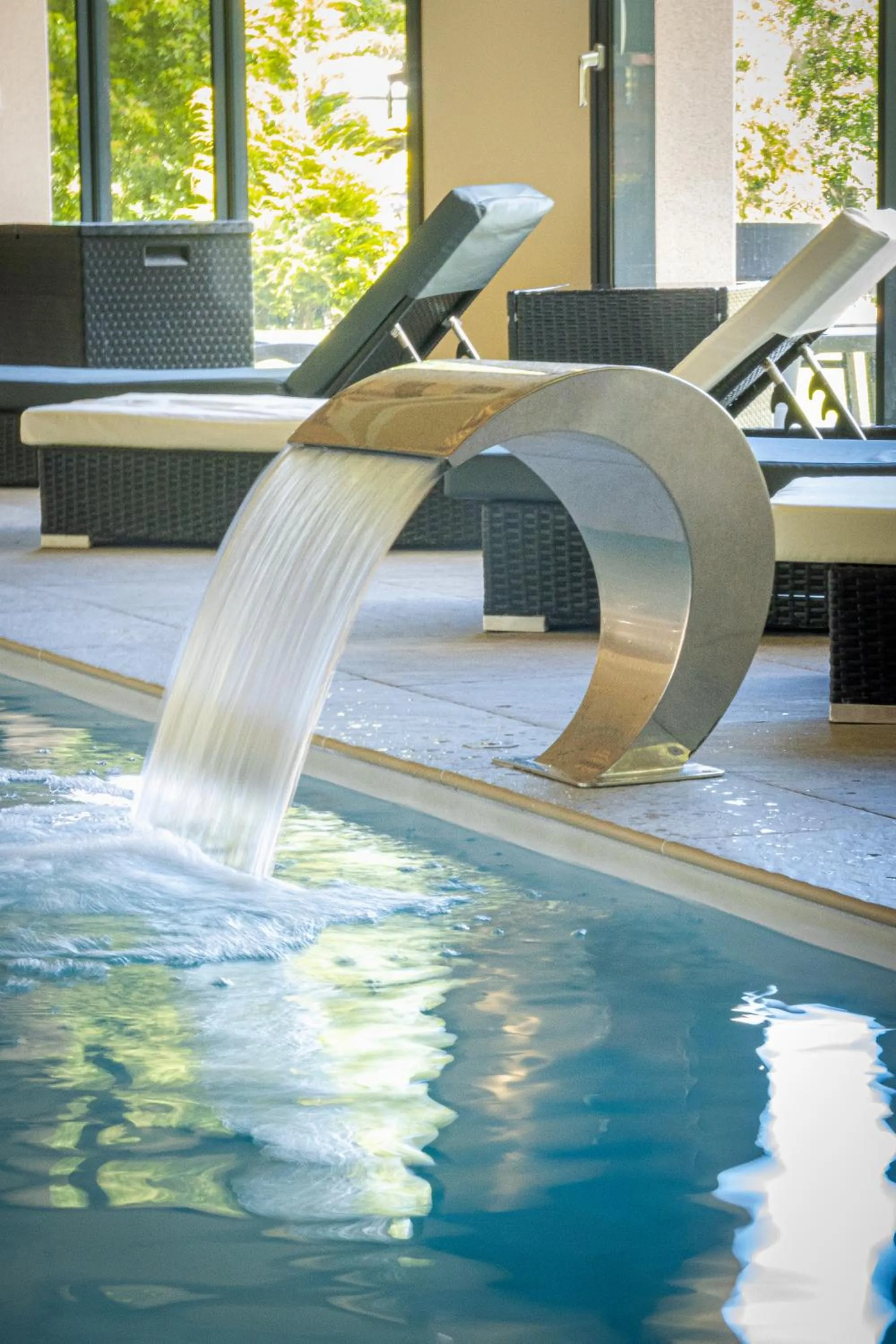 Swimming pool in Hôtel Restaurant Le Régal