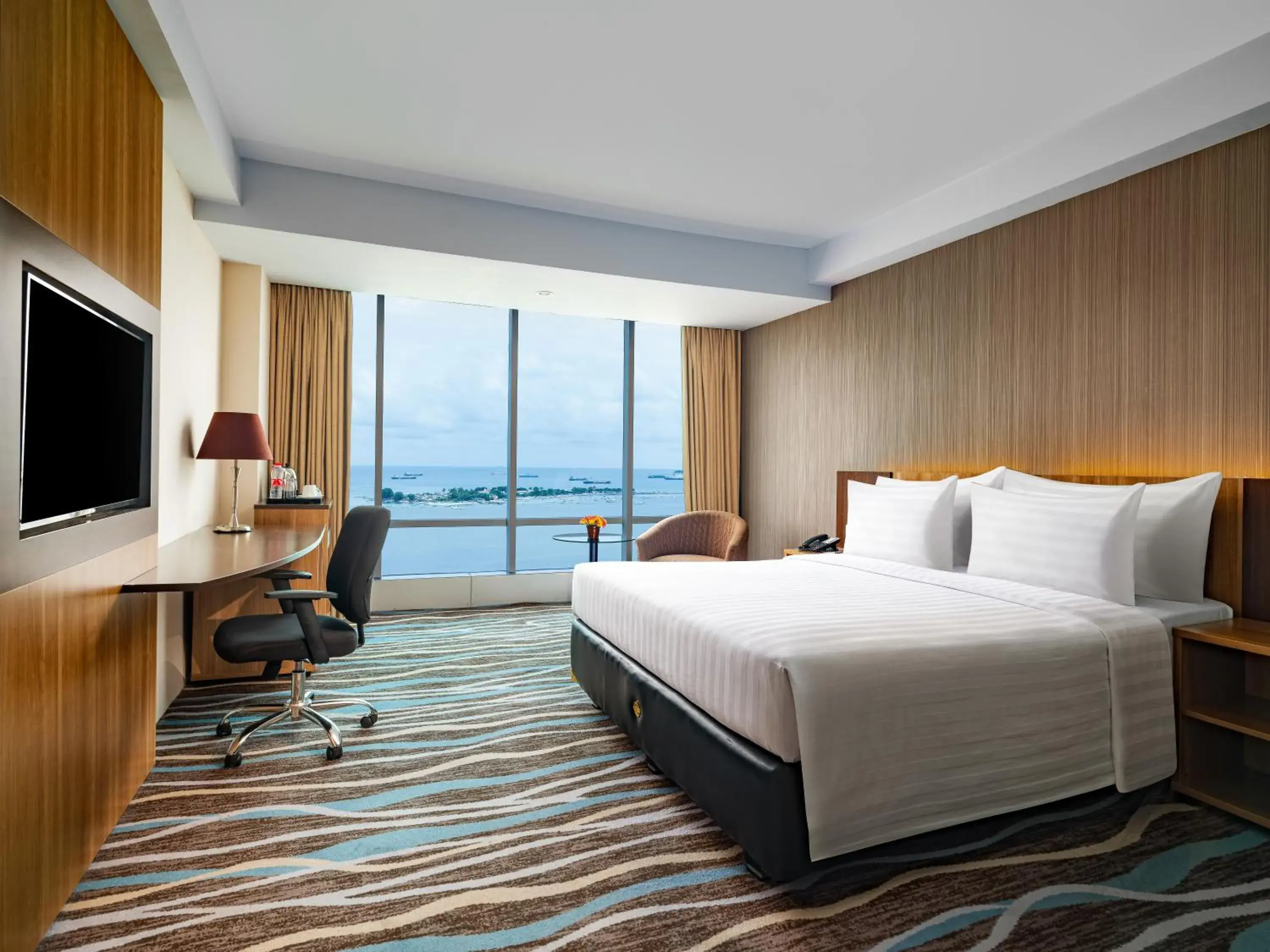 Deluxe Double Room with Sea View in Swiss-Belhotel Makassar Deluxe Double Room with Sea View in Swiss-Belhotel Makassar