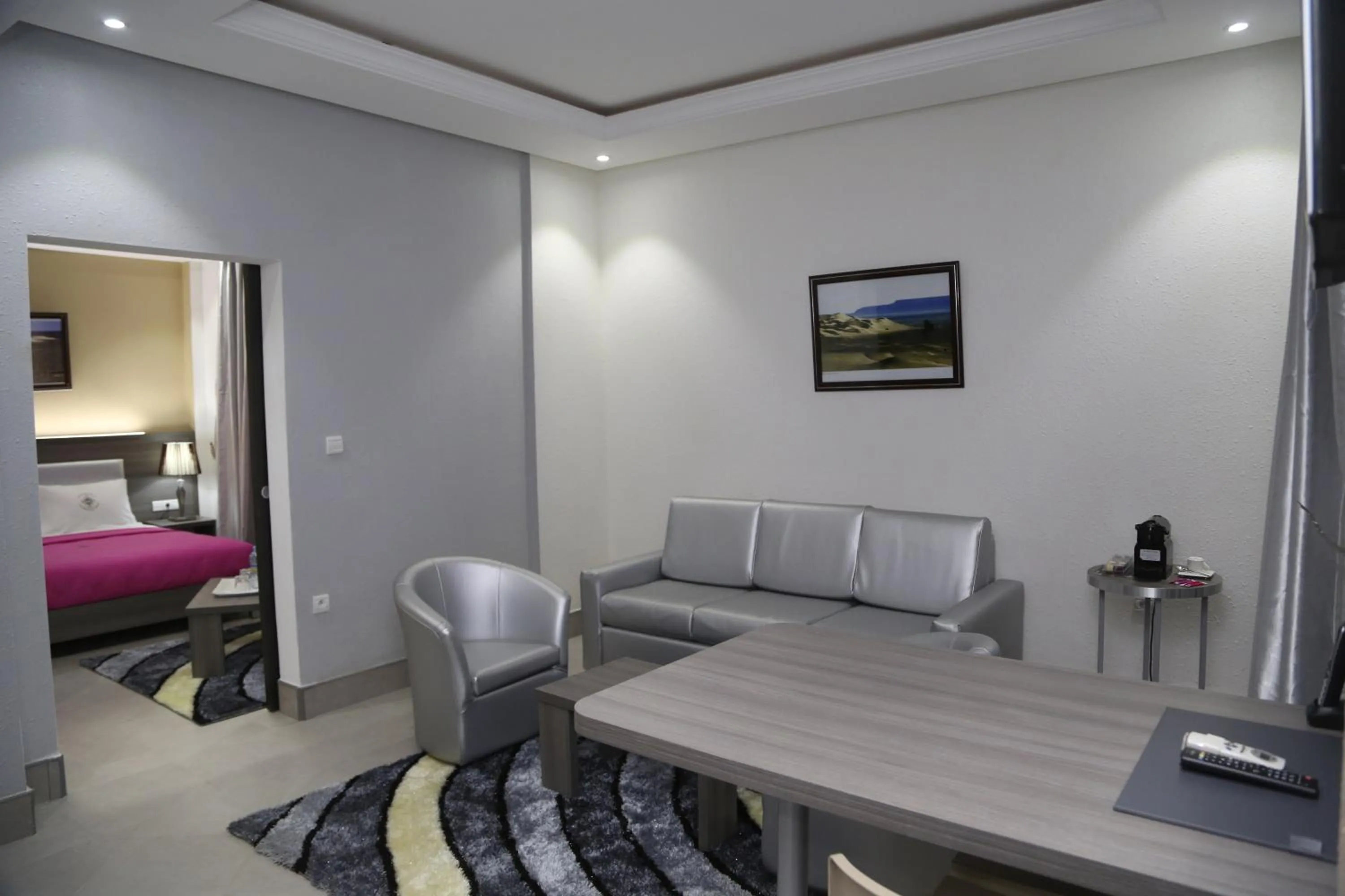 Living room, Bed in Nouakchott Hotel