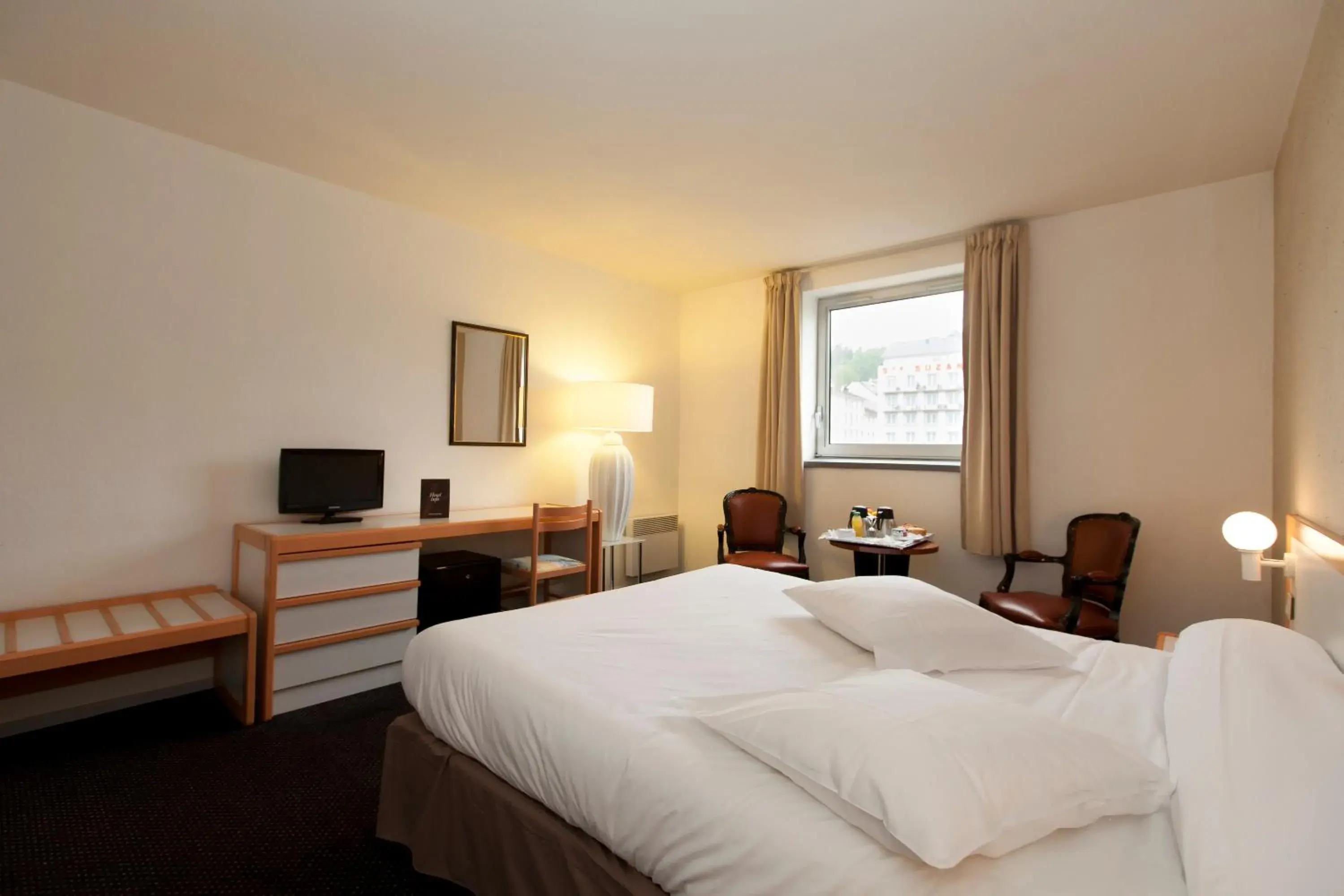 Bed in Hôtel Paradis Bed in Hôtel Paradis