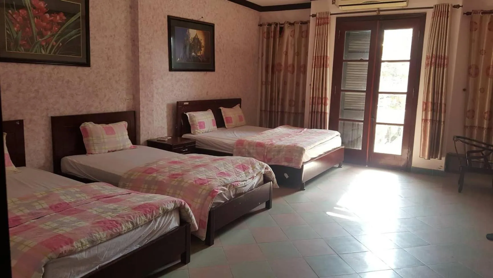 Bed in Hai Duong Hotel