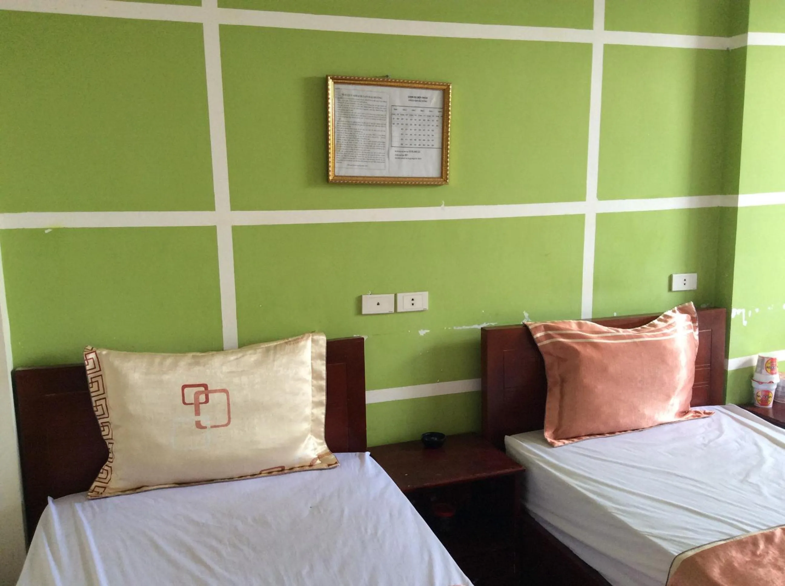 Bed in Hai Duong Hotel