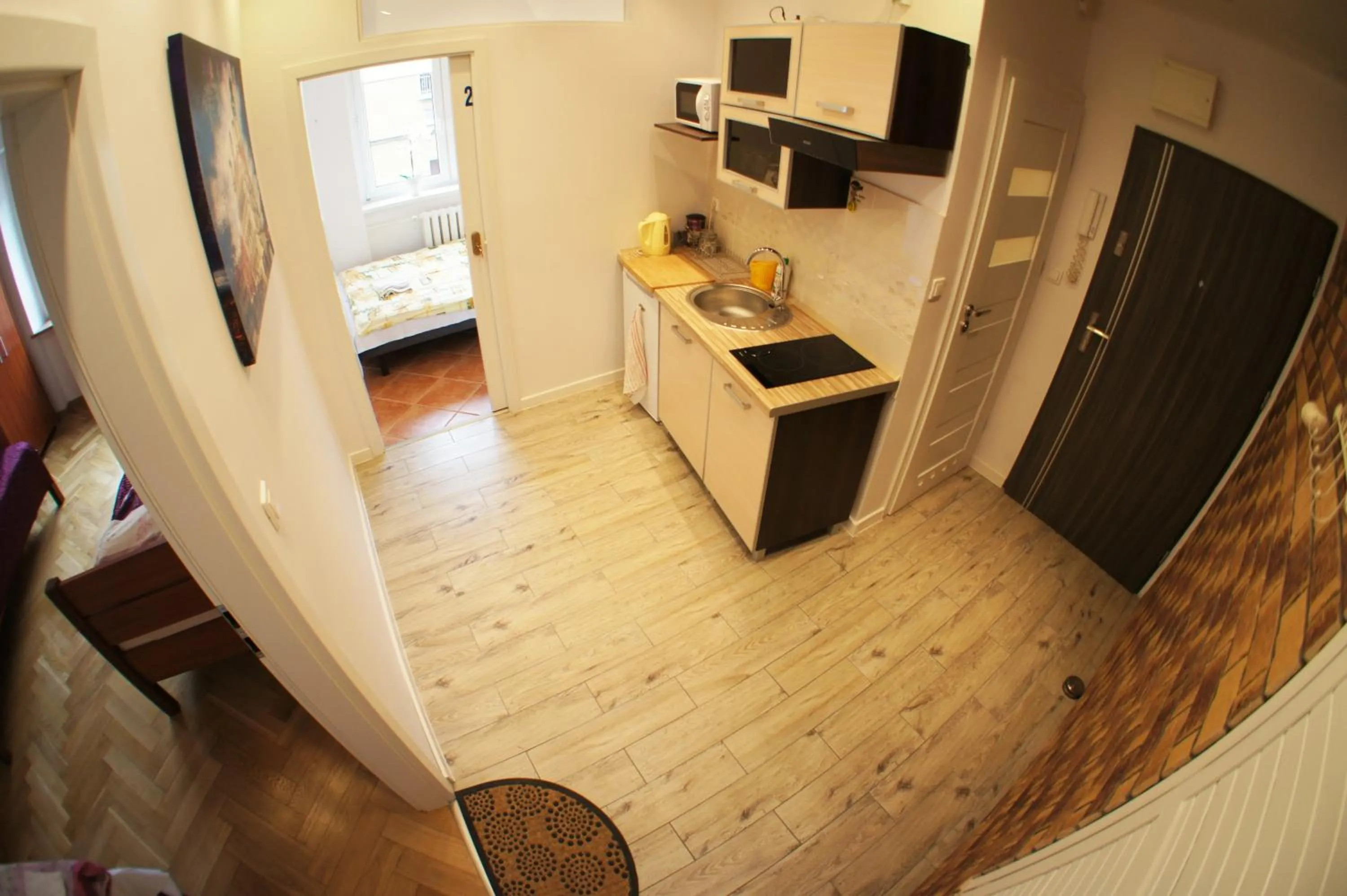 Communal kitchen in Apartament Poznań Jeżyce