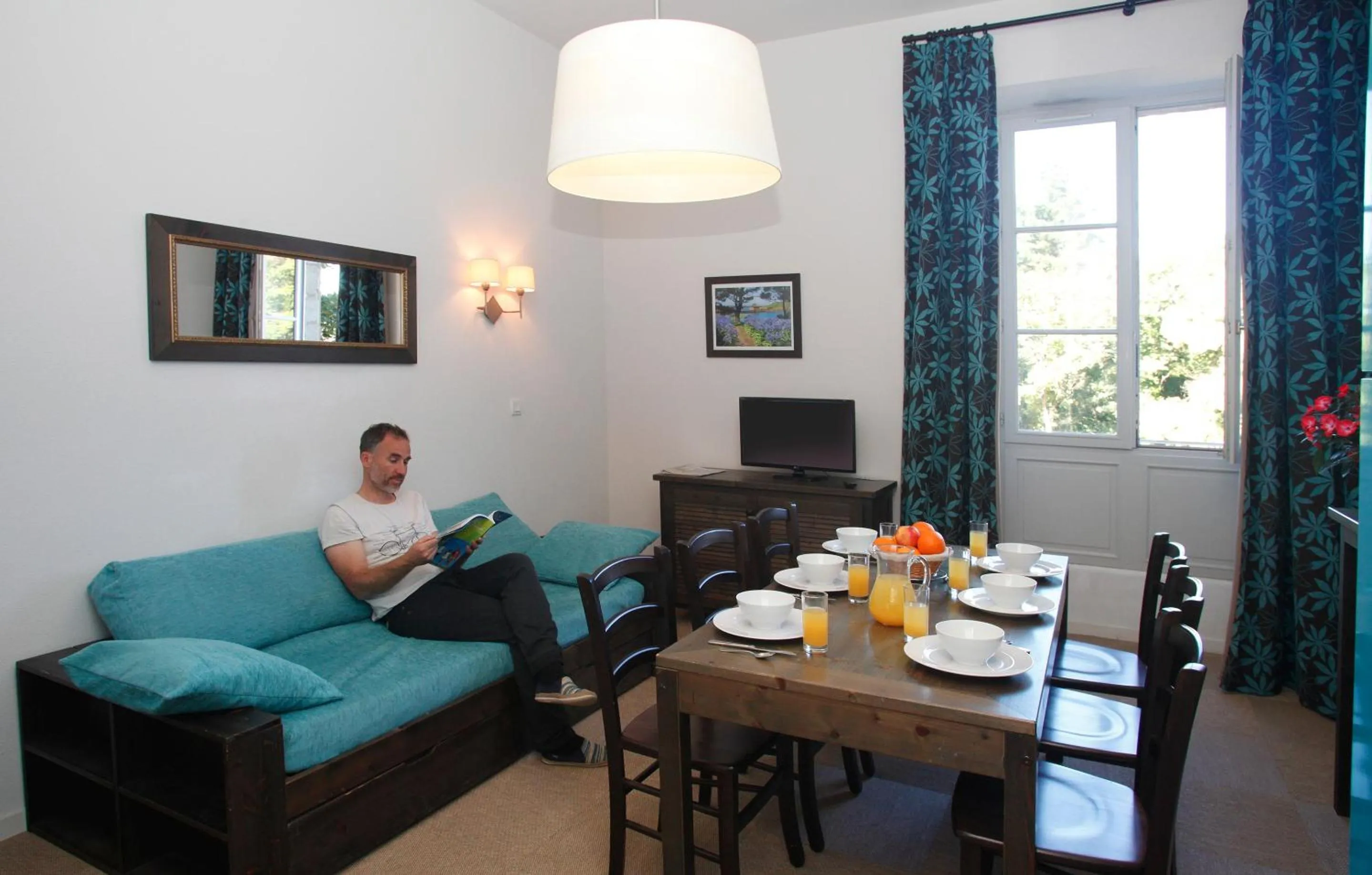 Seating area in Résidence Odalys Le Château de Kéravéon