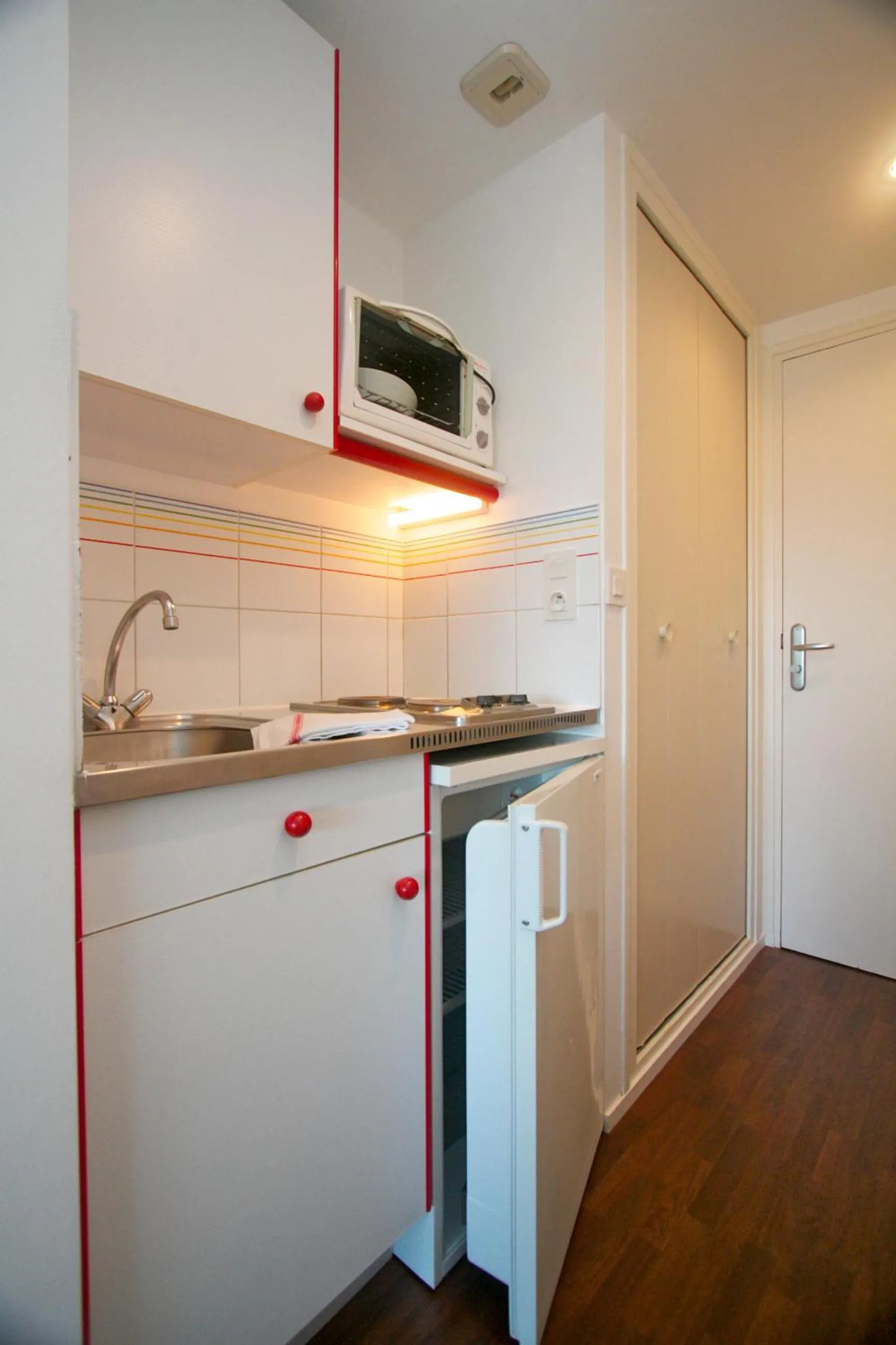 Kitchen or kitchenette in Louison Appart & Suite
