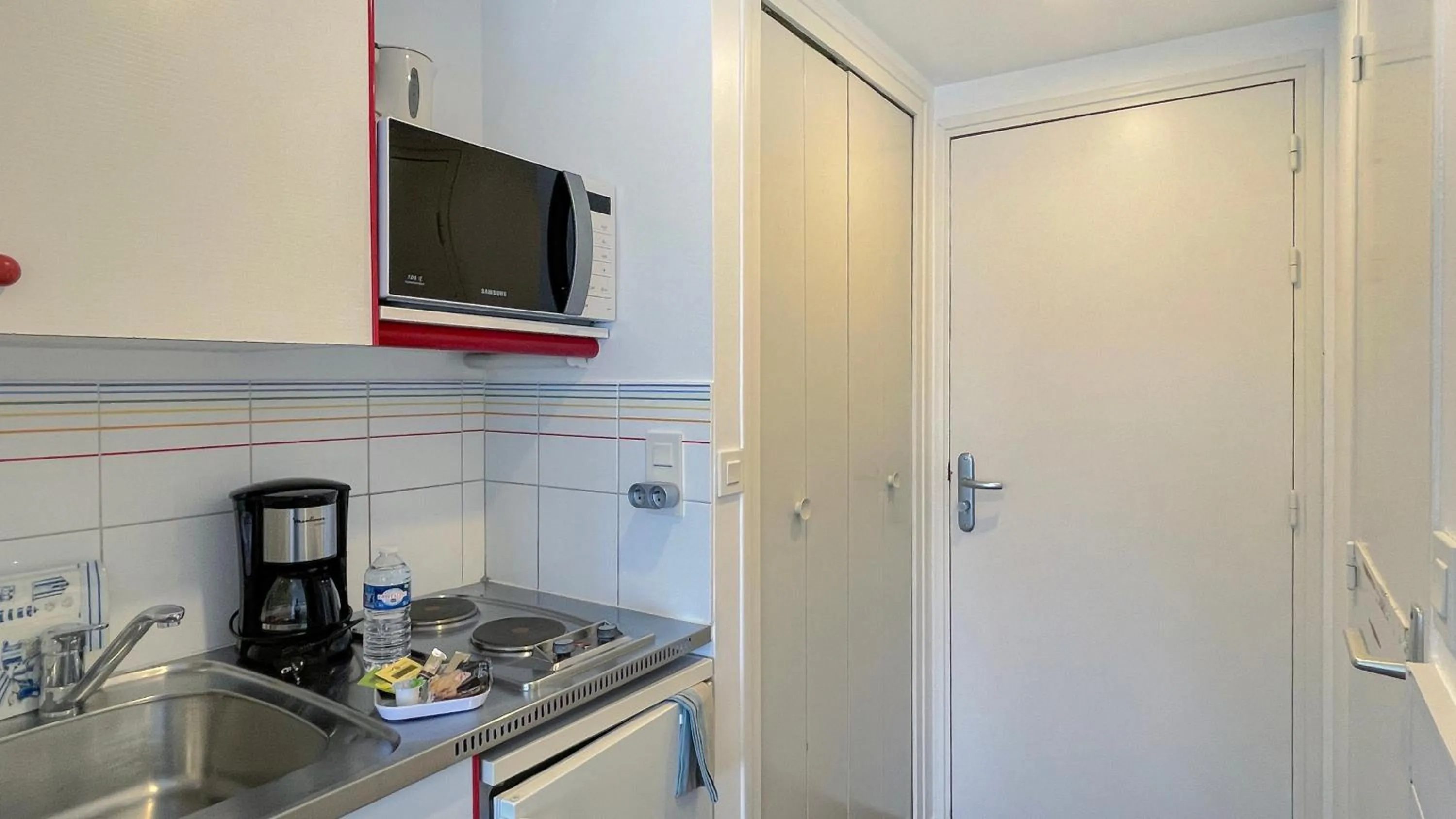 Kitchen or kitchenette in Louison Appart & Suite