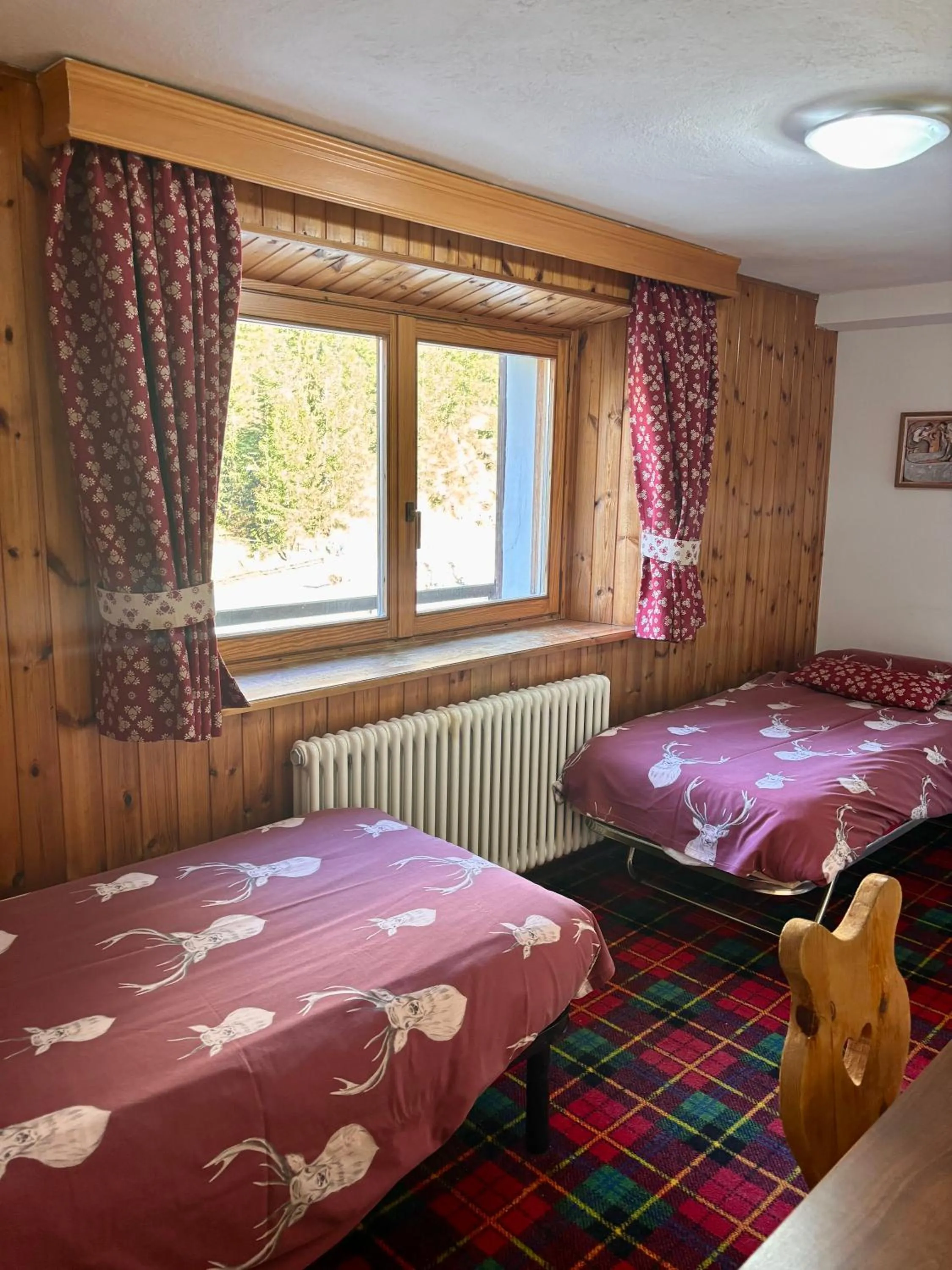 Bed in Hotel Paradisia