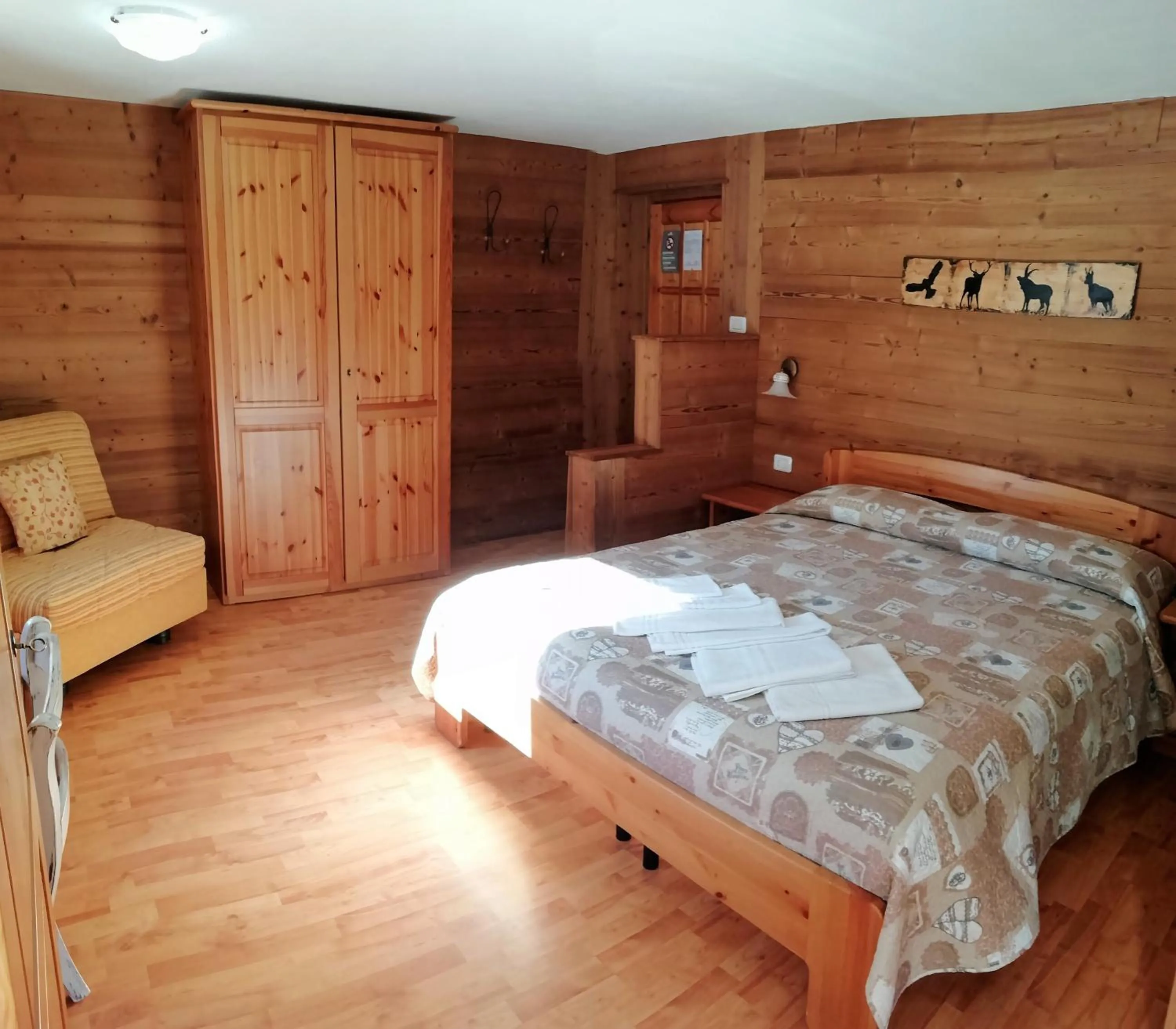 Bed in Hotel Paradisia