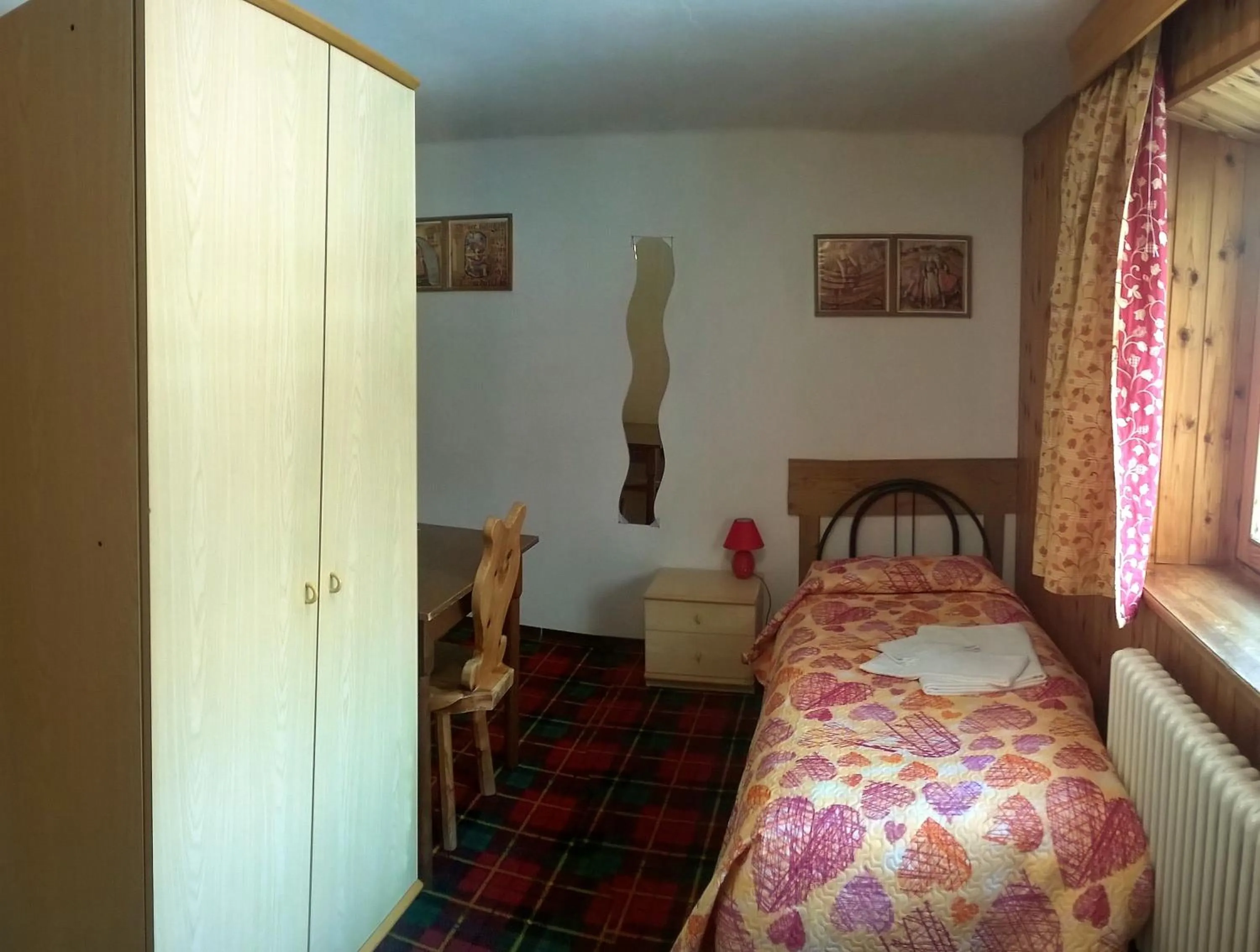 Bed in Hotel Paradisia