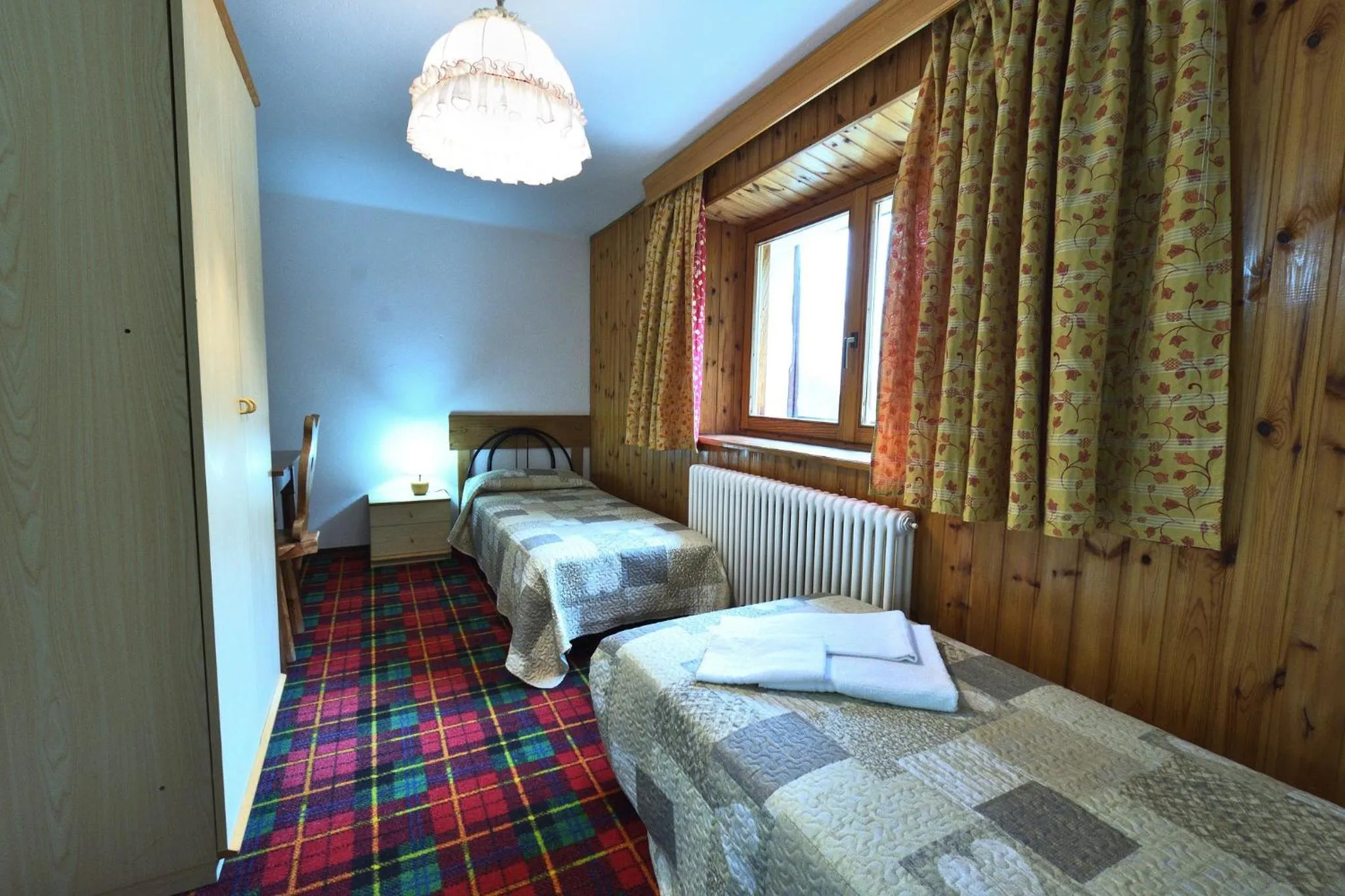 Bed in Hotel Paradisia