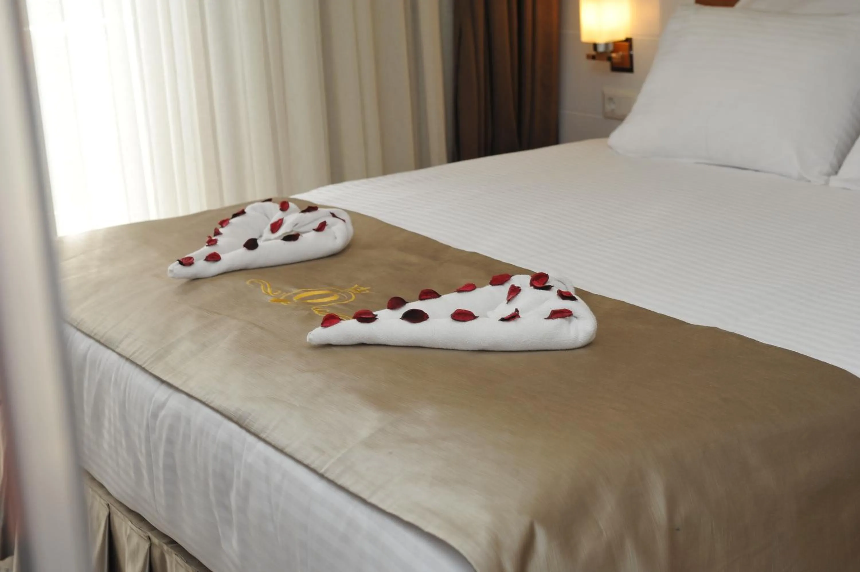 Decorative detail, Bed in Qamar Prestige Suites