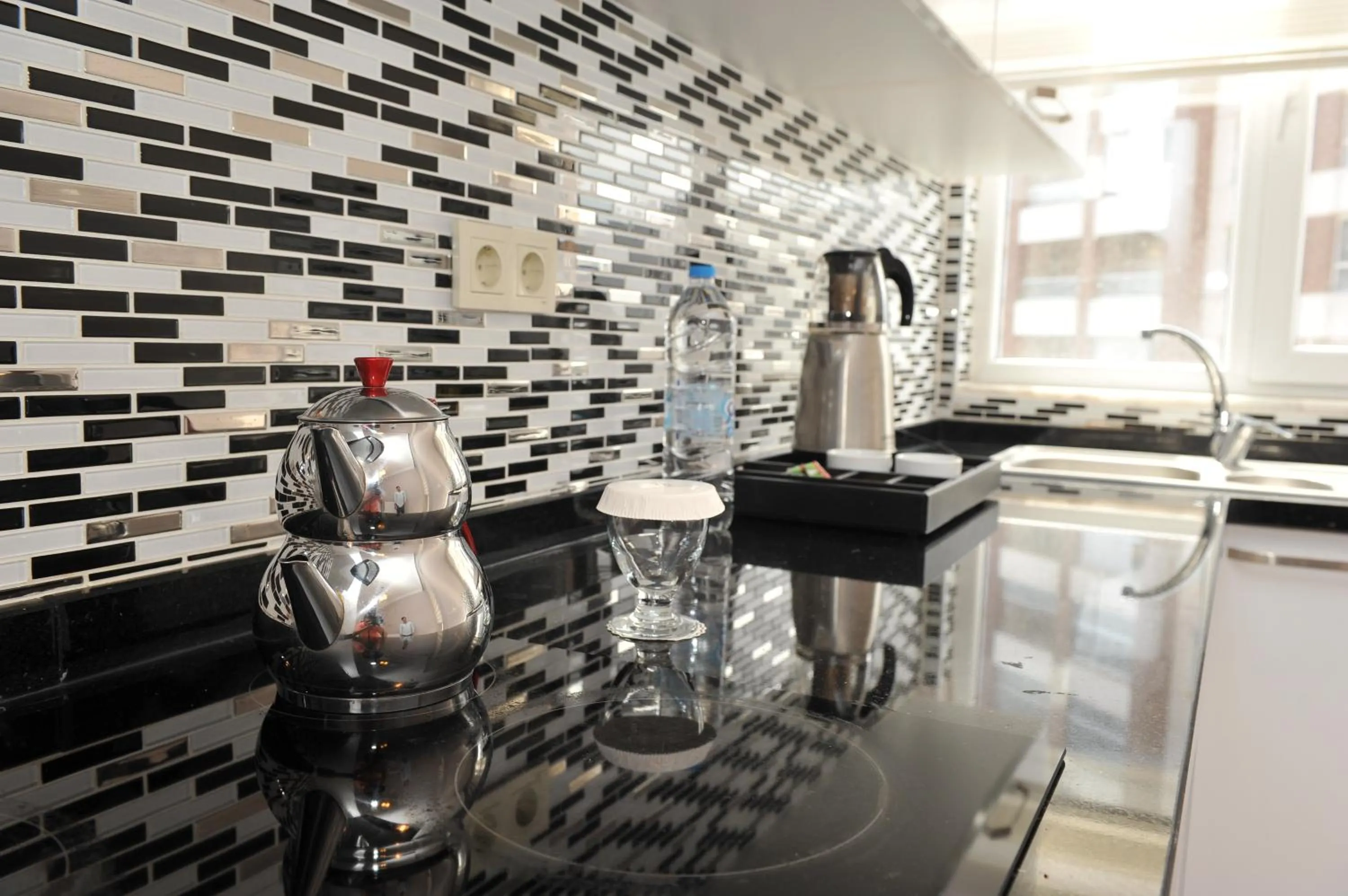 Kitchen or kitchenette in Qamar Prestige Suites