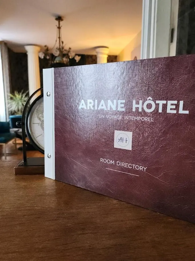 Bedroom in Ariane Hôtel