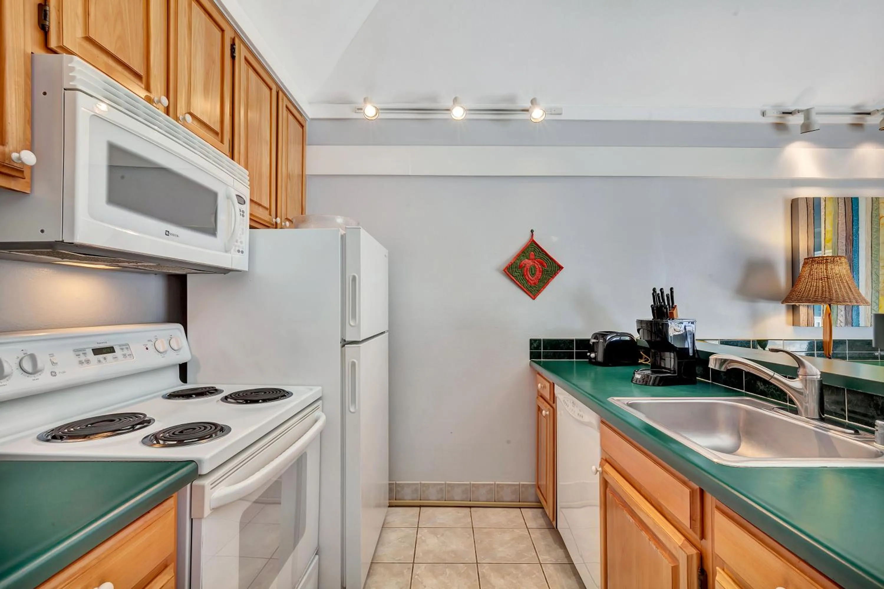 kitchen in Kiahuna Plantation and Beach Bungalows by Castle