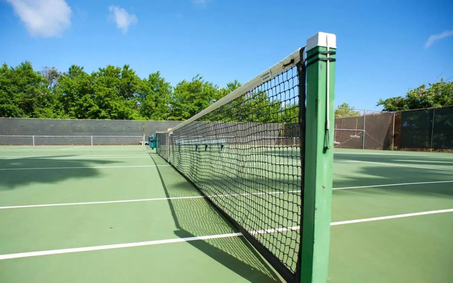 Tennis court in Kiahuna Plantation and Beach Bungalows by Castle Tennis court in Kiahuna Plantation and Beach Bungalows by Castle