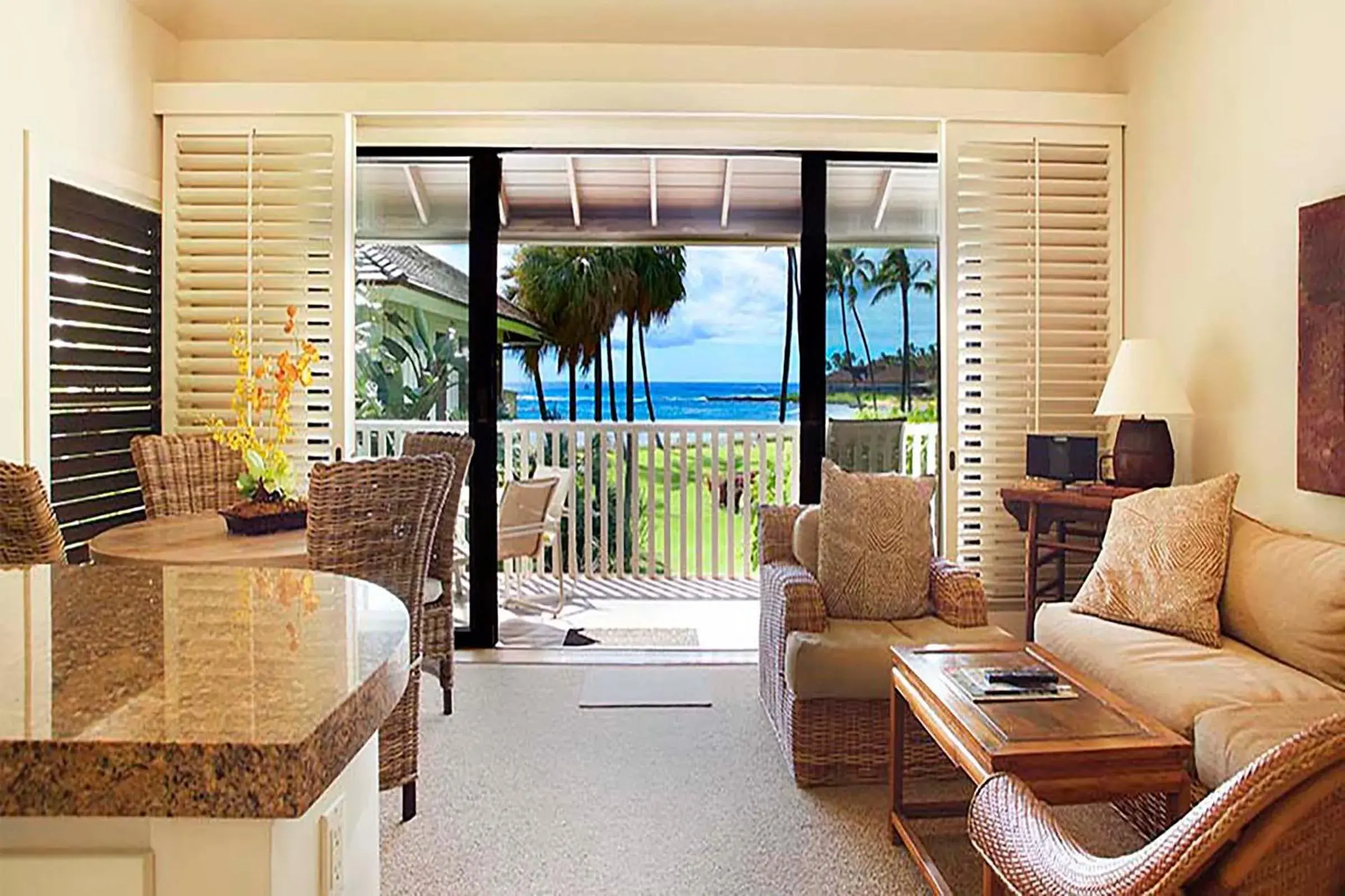 Living room in Kiahuna Plantation and Beach Bungalows by Castle Living room in Kiahuna Plantation and Beach Bungalows by Castle