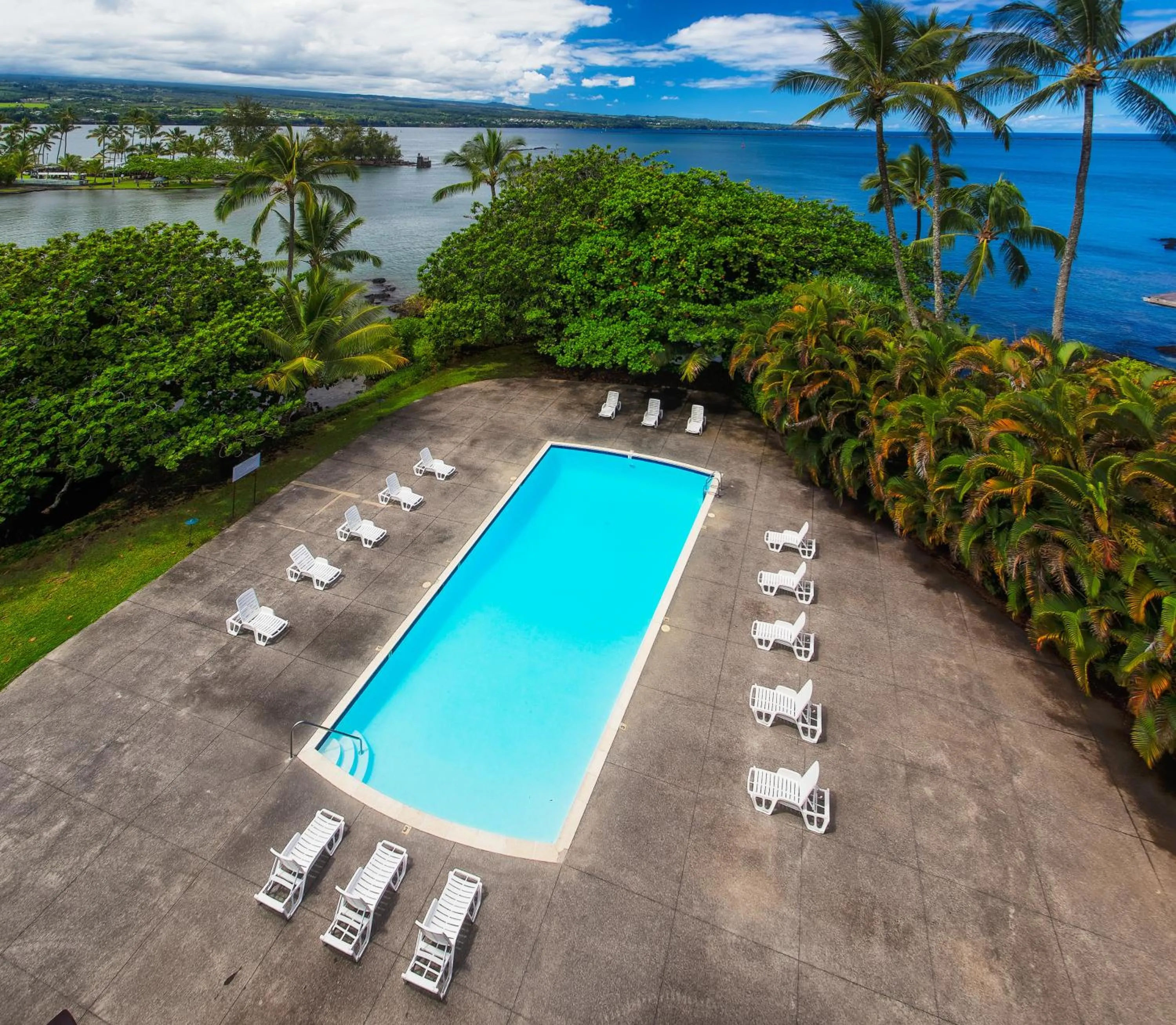 Swimming pool in Hilo Hawaiian Hotel, Trademark Collection by Wyndham