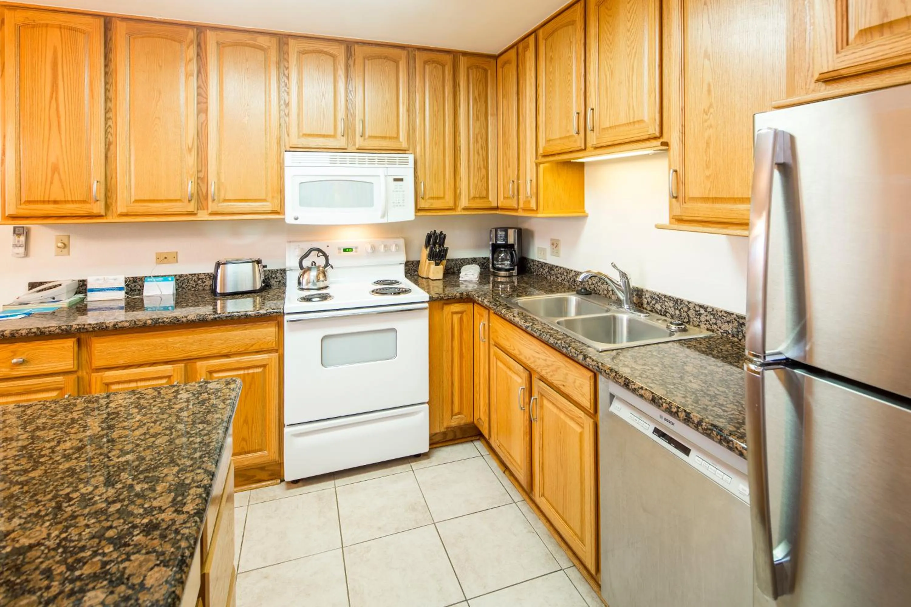 Kitchen or kitchenette in Castle Kama'ole Sands