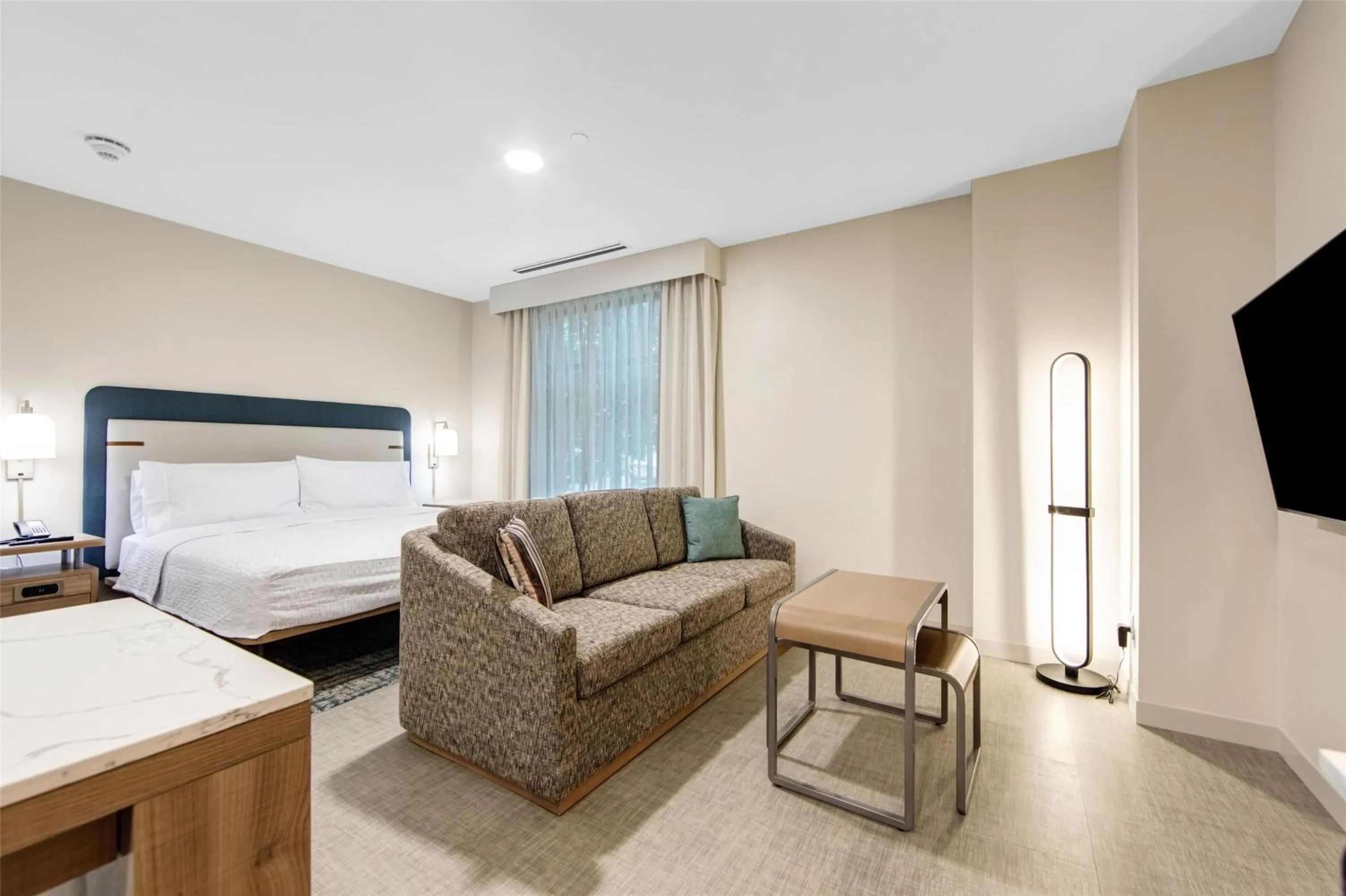 Living room, Bed in Homewood Suites by Hilton East Rutherford - Meadowlands, NJ