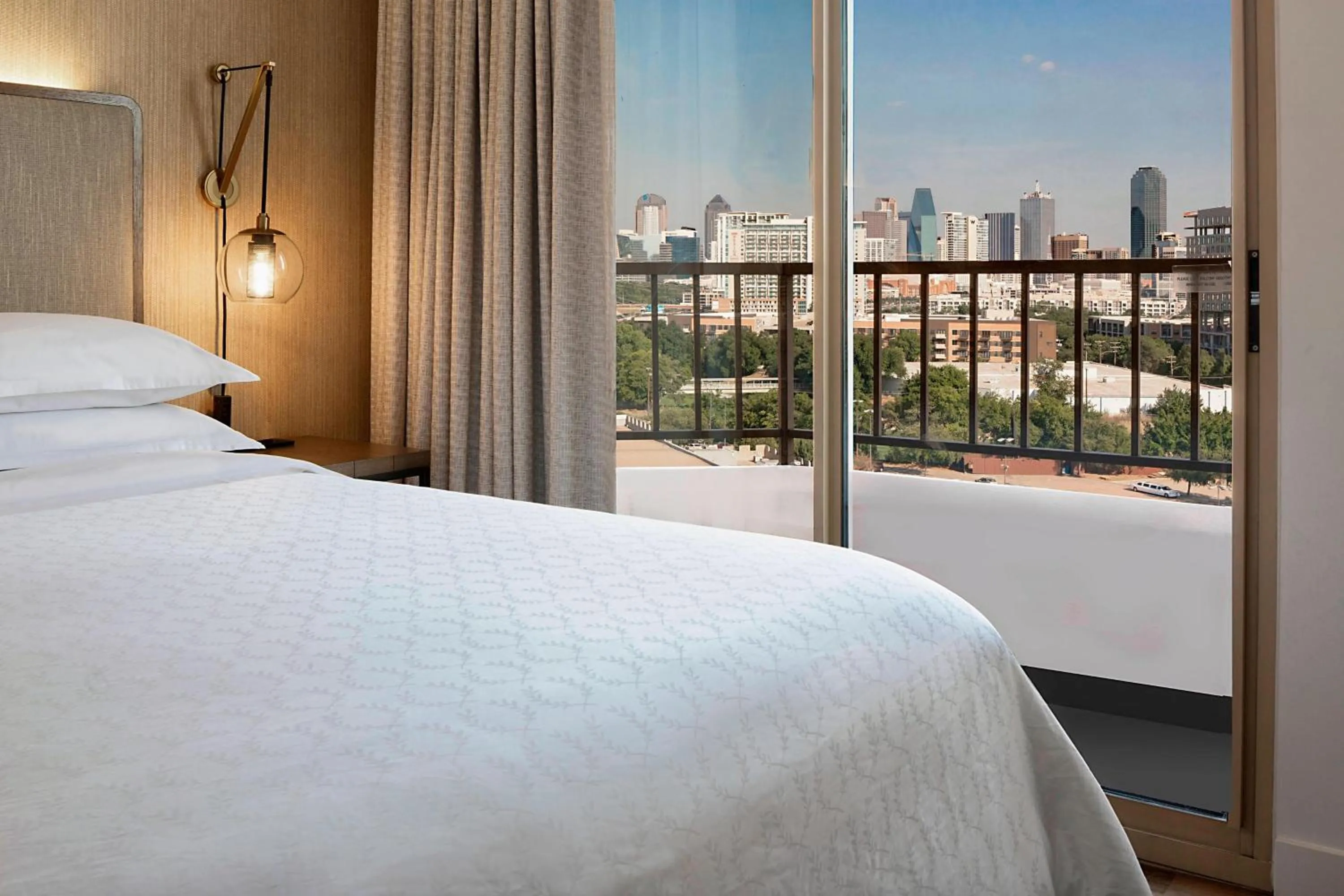 Photo of the whole room, Bed in Sheraton Suites Market Center Dallas