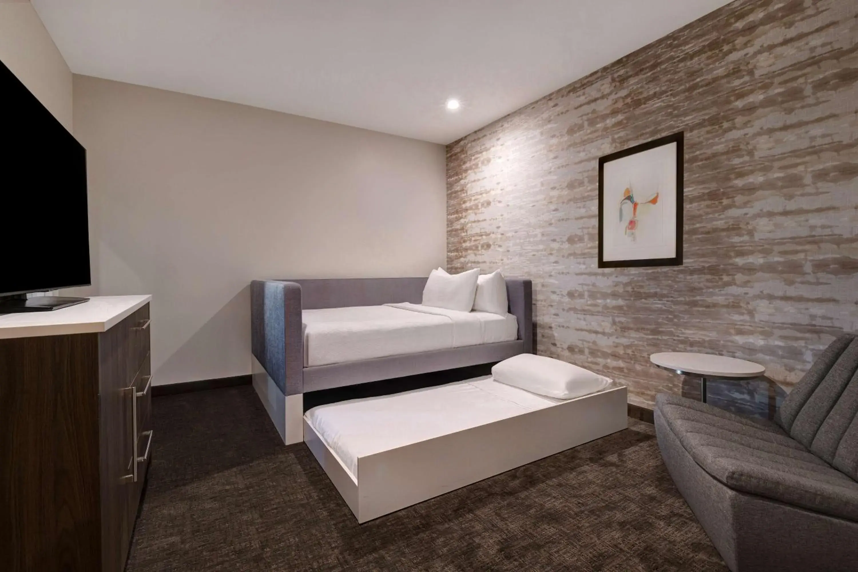 Living room, Bed in Home2 Suites By Hilton Anaheim Resort Living room, Bed in Home2 Suites By Hilton Anaheim Resort