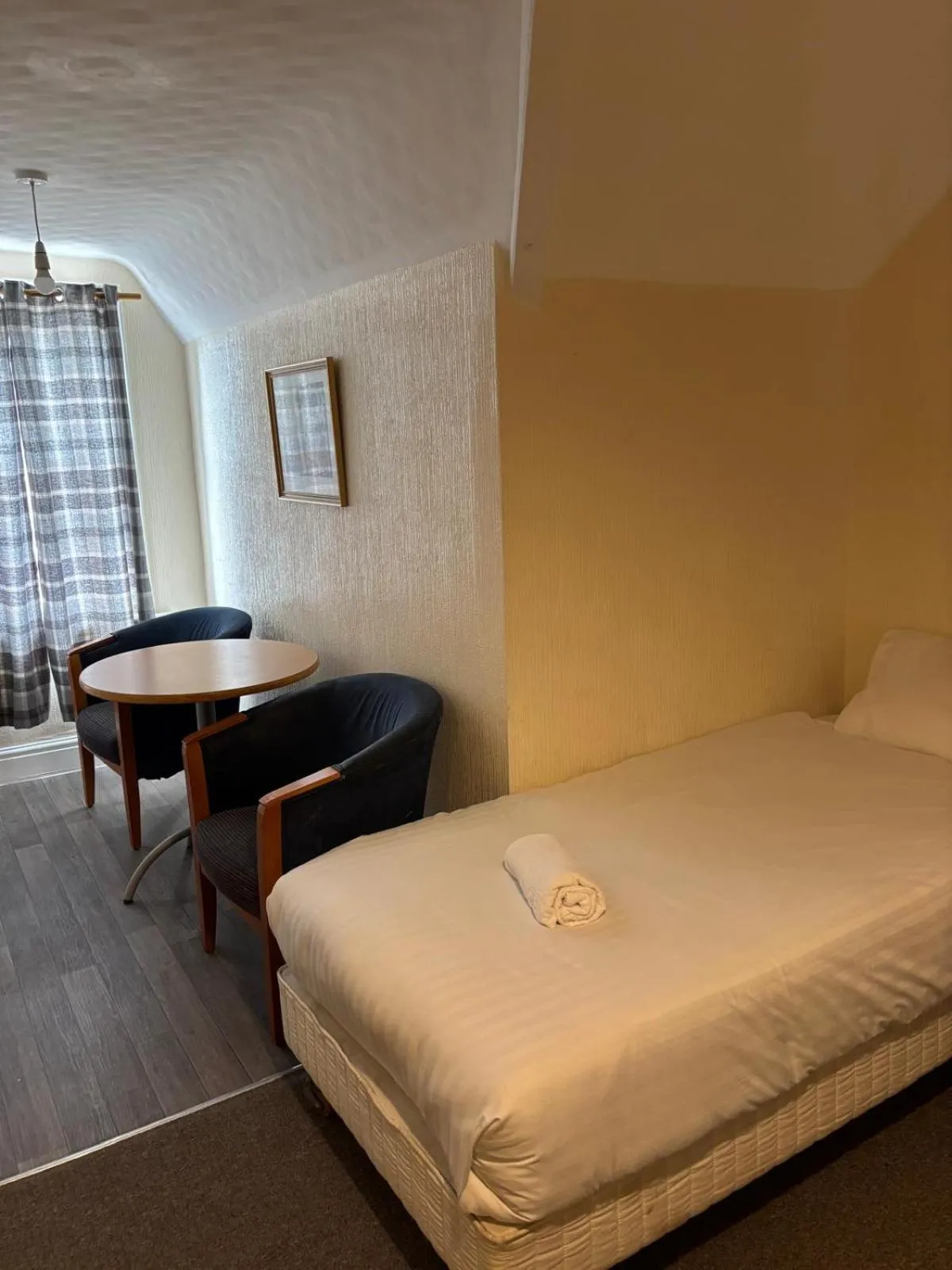 Bed in The Tudor House Hotel